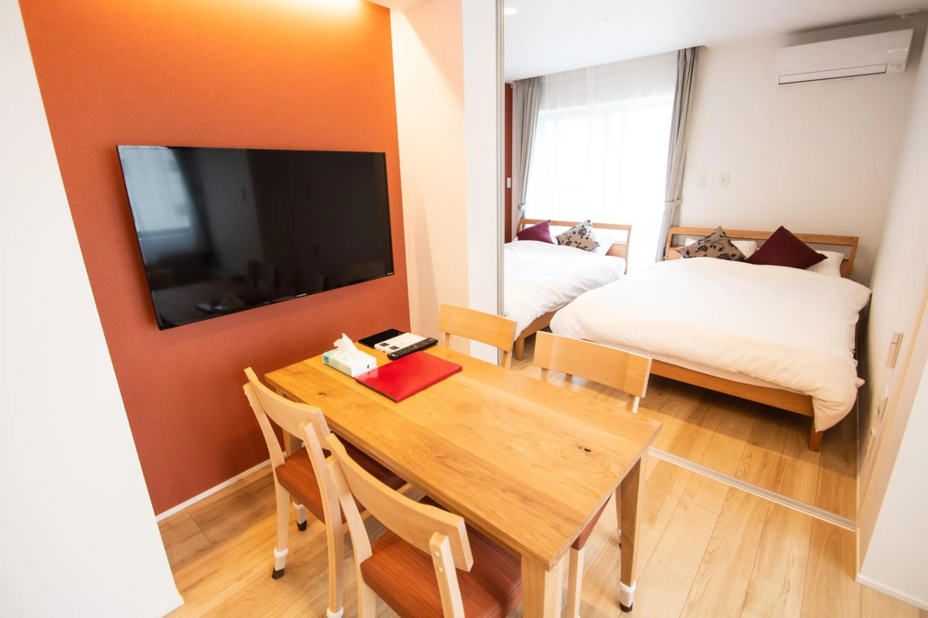 Bed in Apartment Hotel Tenjin TUMUGU