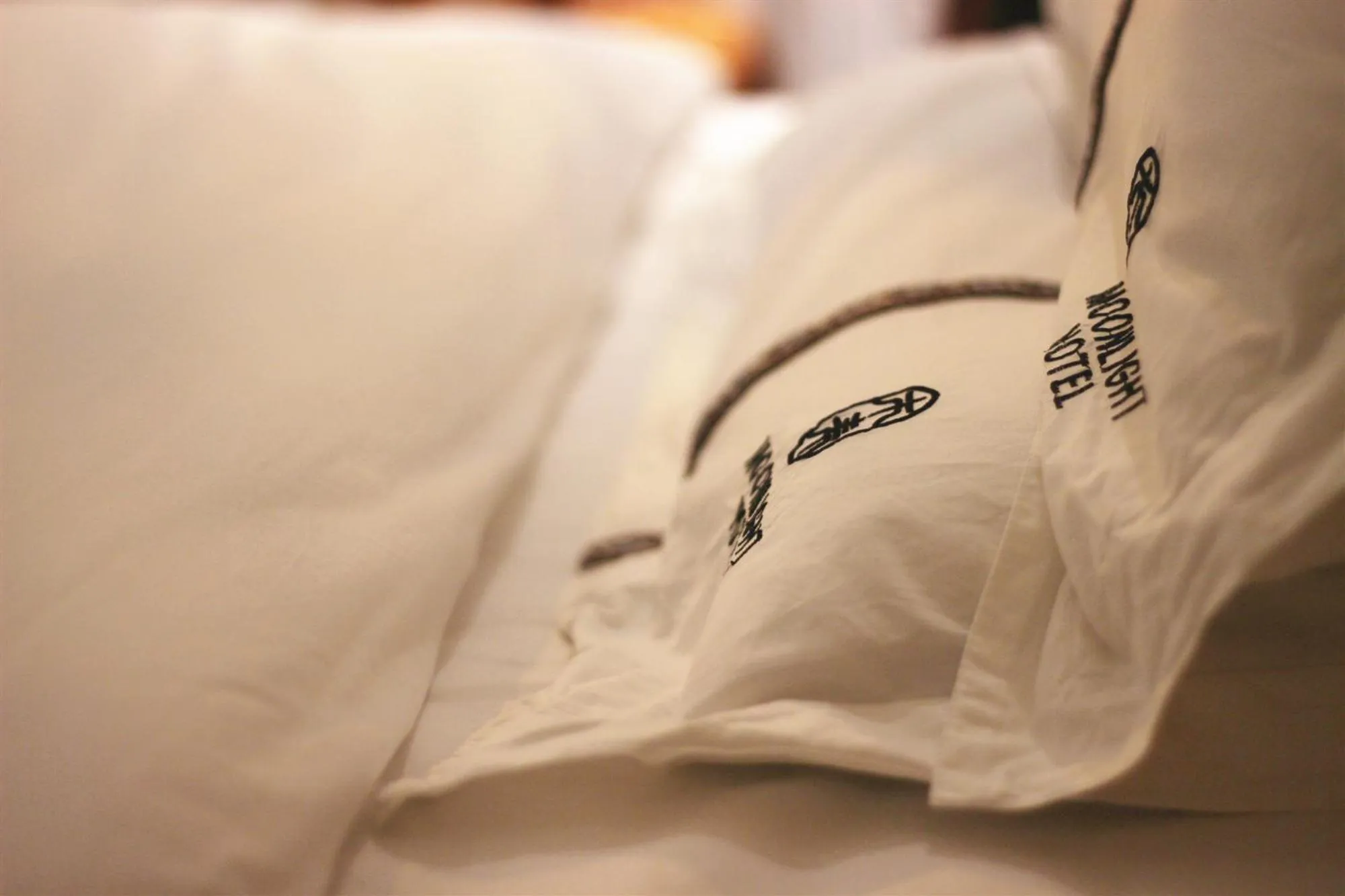 Bed in Moonlight Hotel