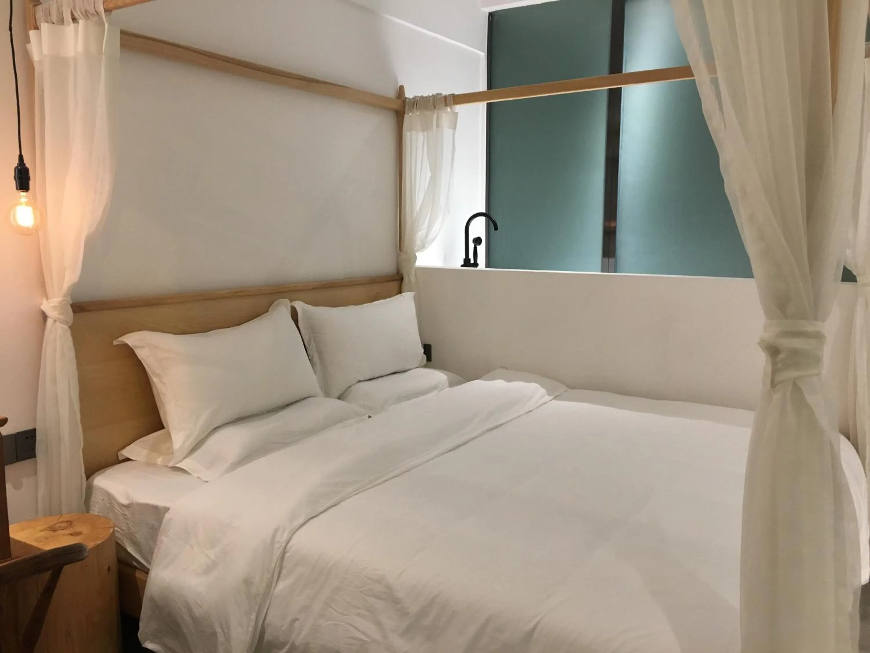 Bed in Moonlight Hotel