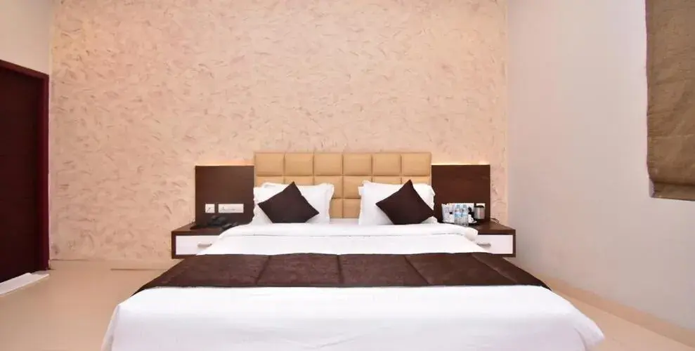 Bed in Hotel Le Sapphire Bed in Hotel Le Sapphire