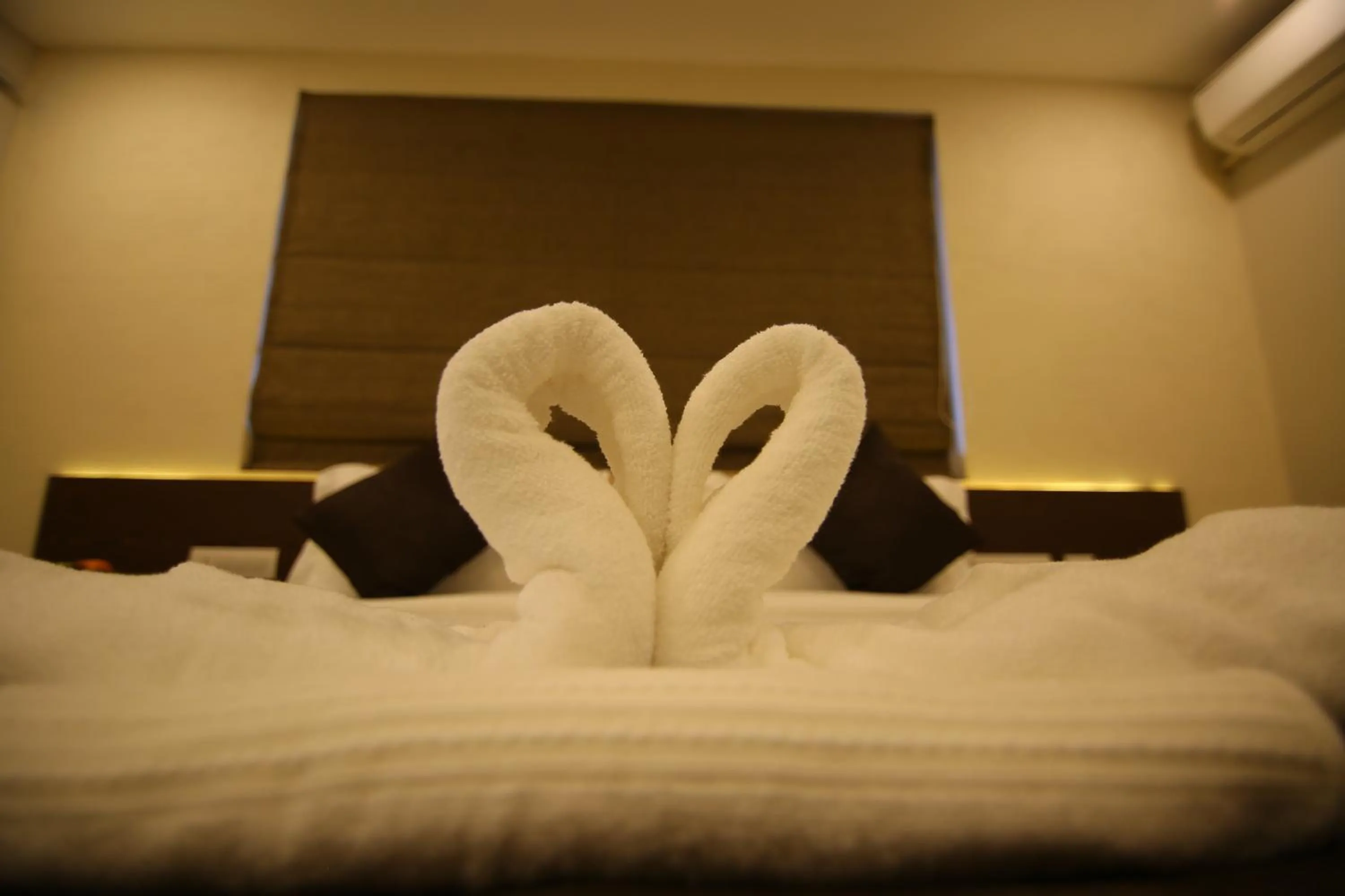 Bed in Hotel Le Sapphire