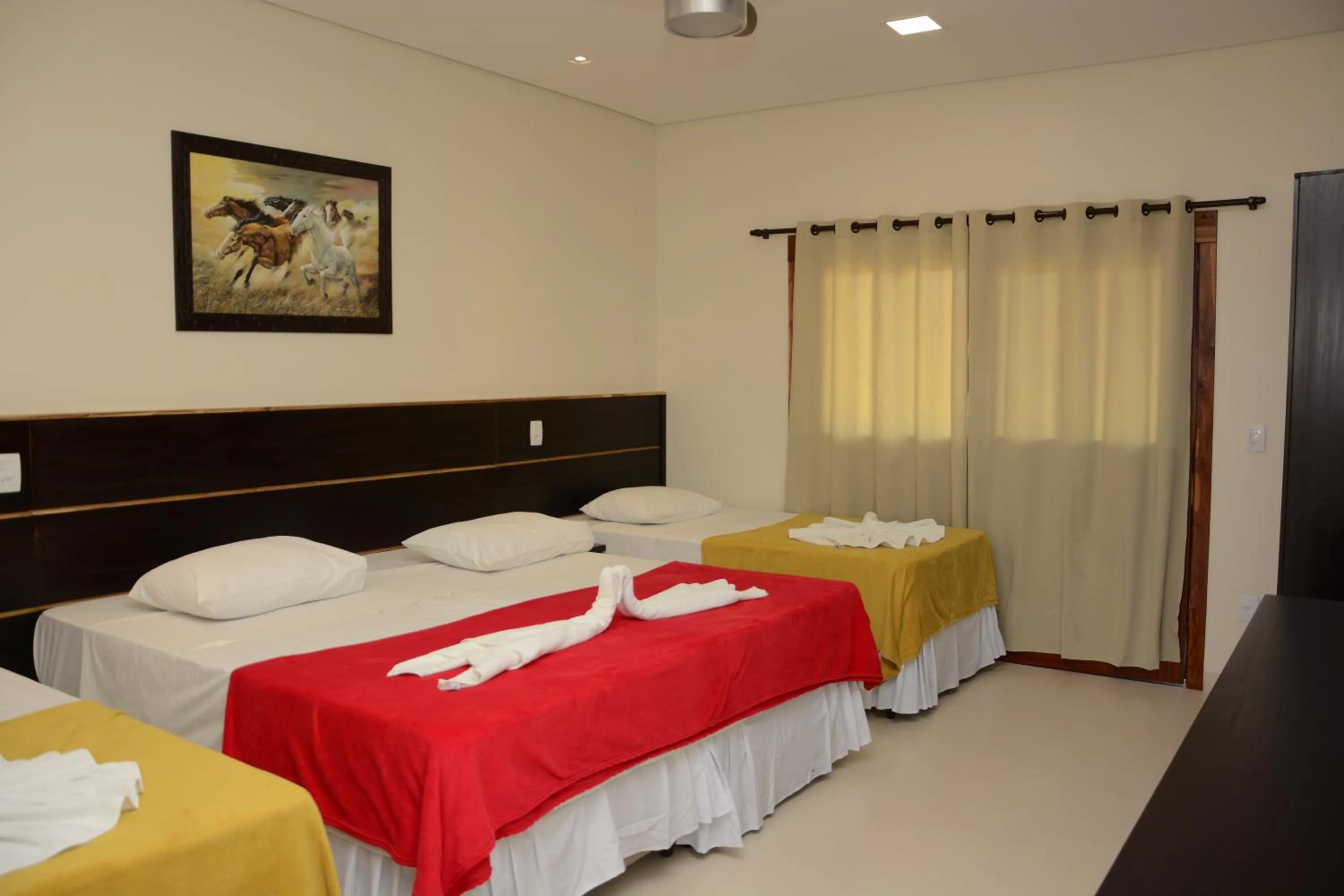 Bed in Pousada Piuval