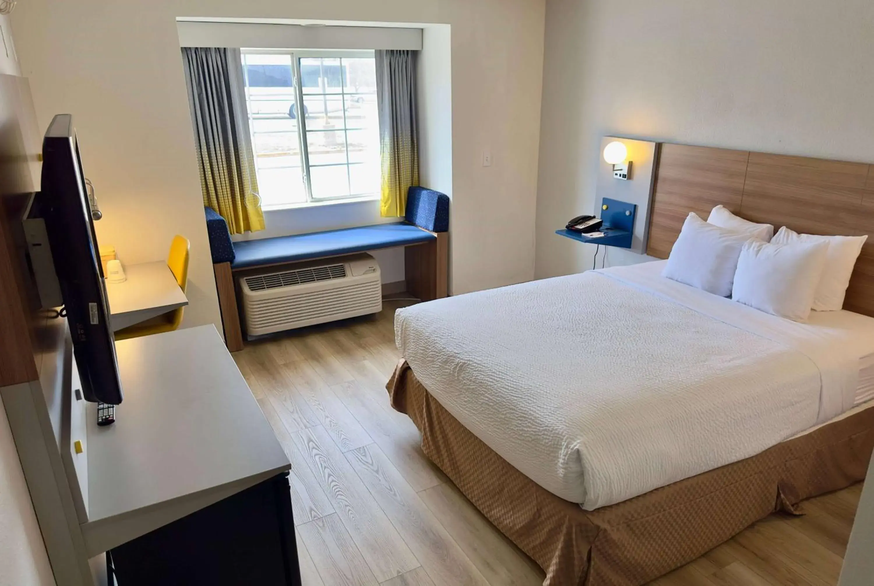 Photo of the whole room, Bed in Microtel Inn & Suites by Wyndham Denver Airport Photo of the whole room, Bed in Microtel Inn & Suites by Wyndham Denver Airport