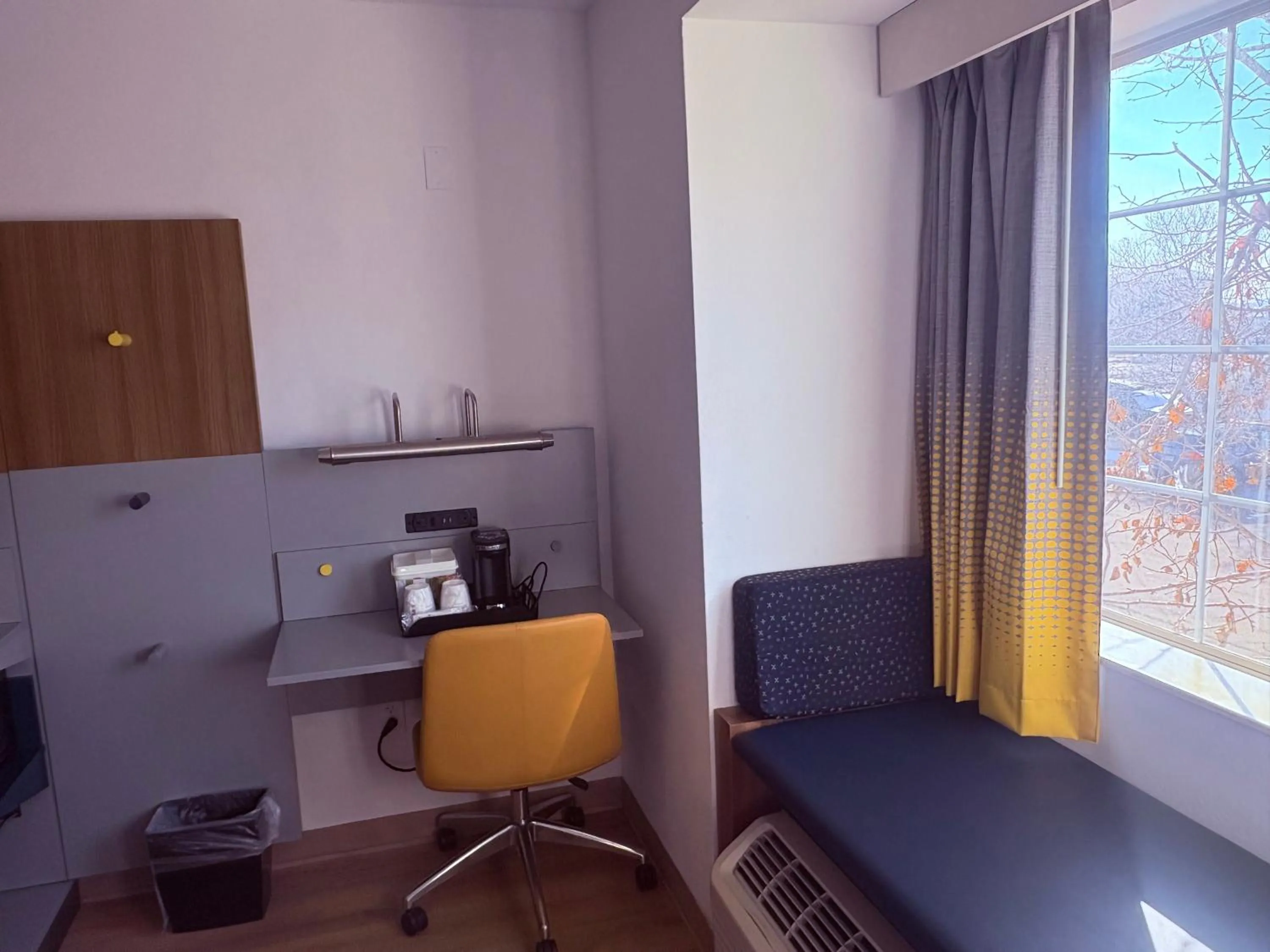 Seating area in Microtel Inn & Suites by Wyndham Denver Airport