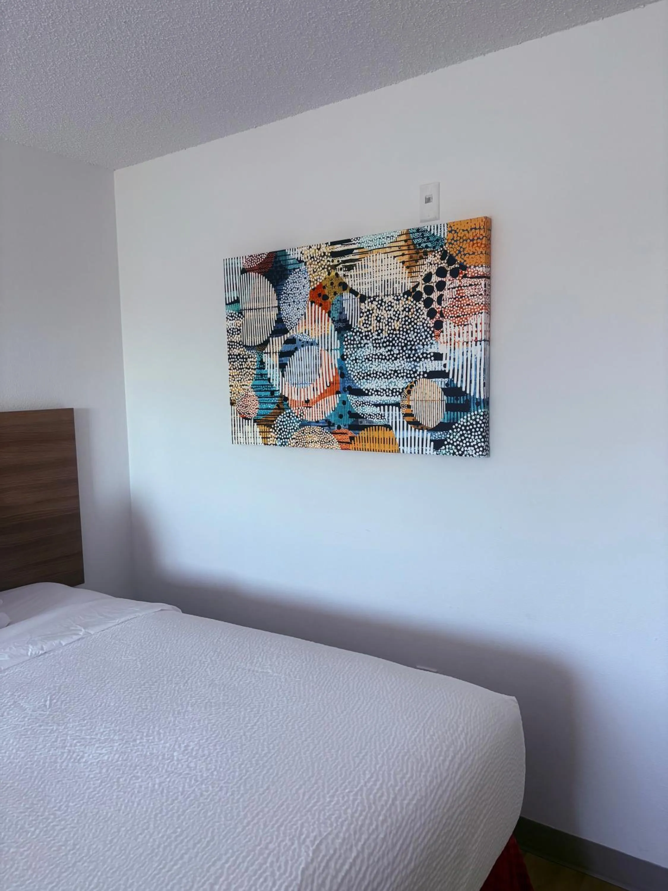 Decorative detail, Bed in Microtel Inn & Suites by Wyndham Denver Airport