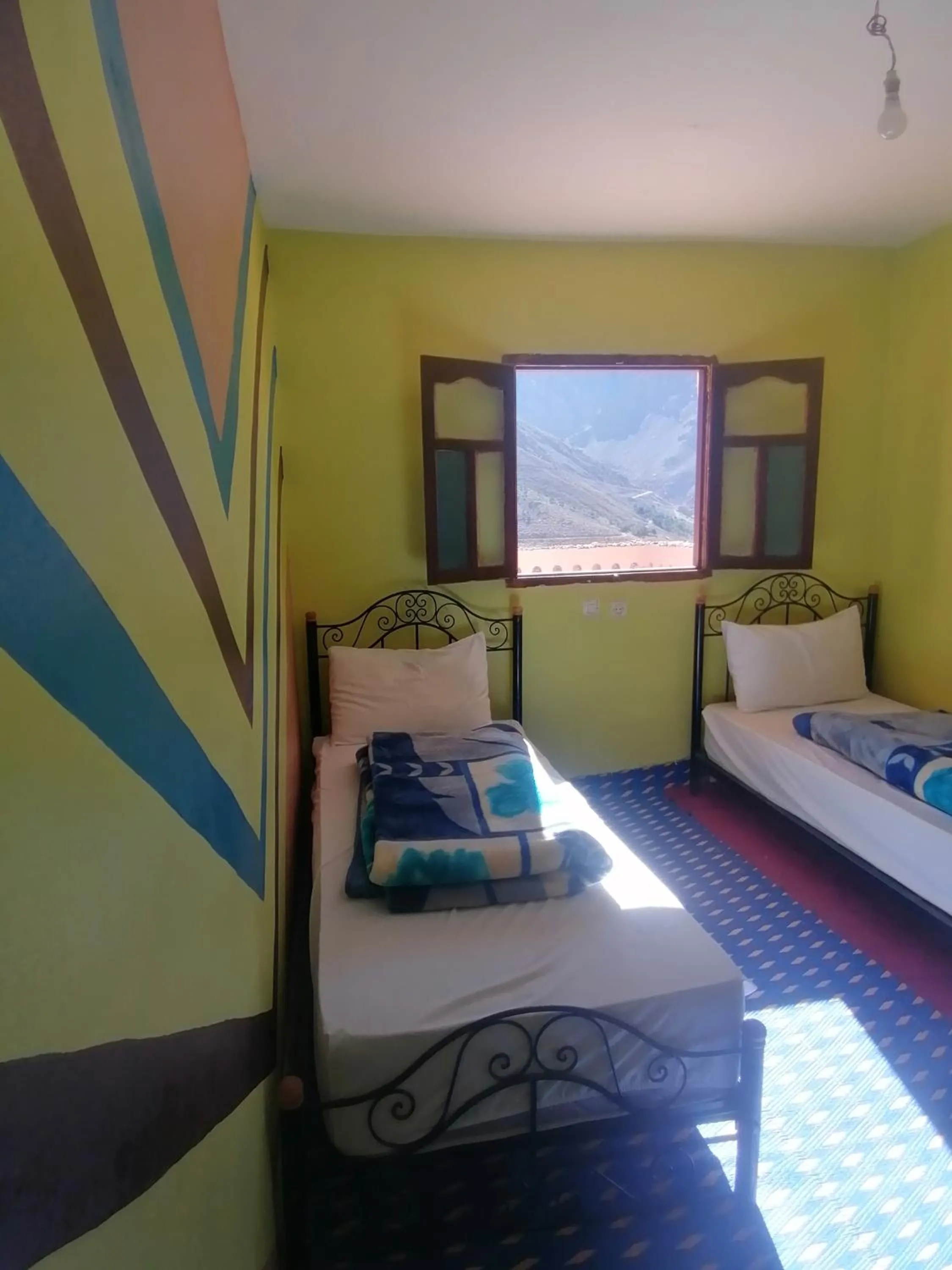 Bed in Gite Angour Tacheddirt