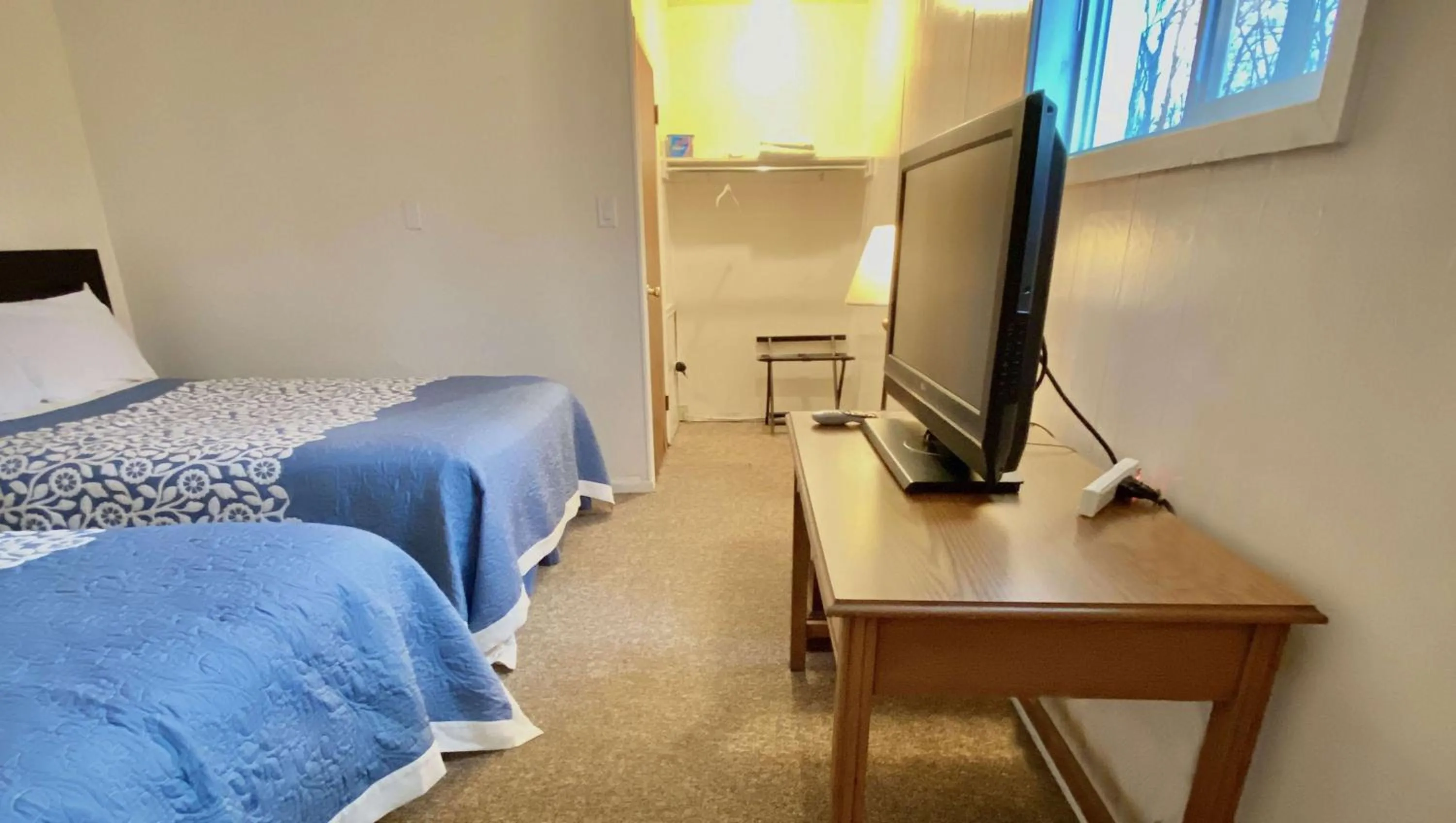 Photo of the whole room, Bed in Country Place Inn and Suites White Haven