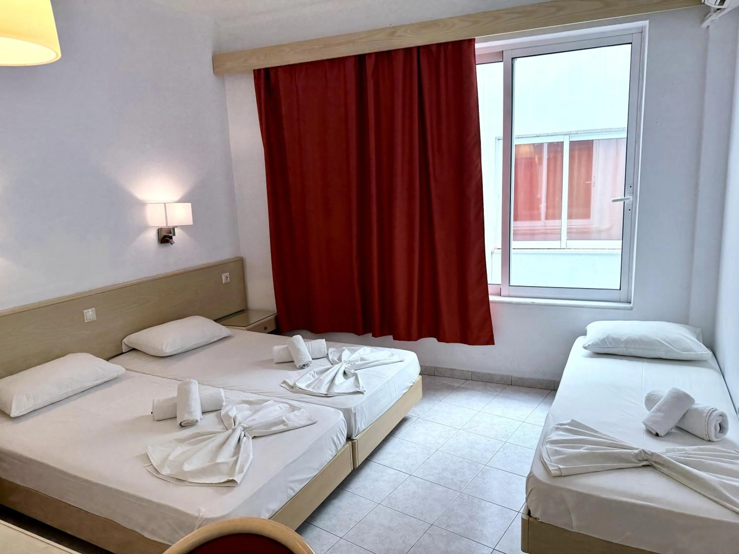 Bed in Savoy City Hotel