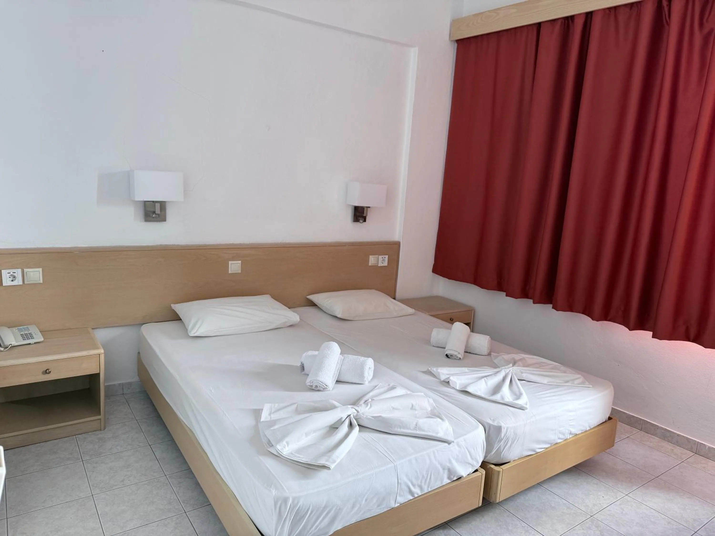 Bed in Savoy City Hotel