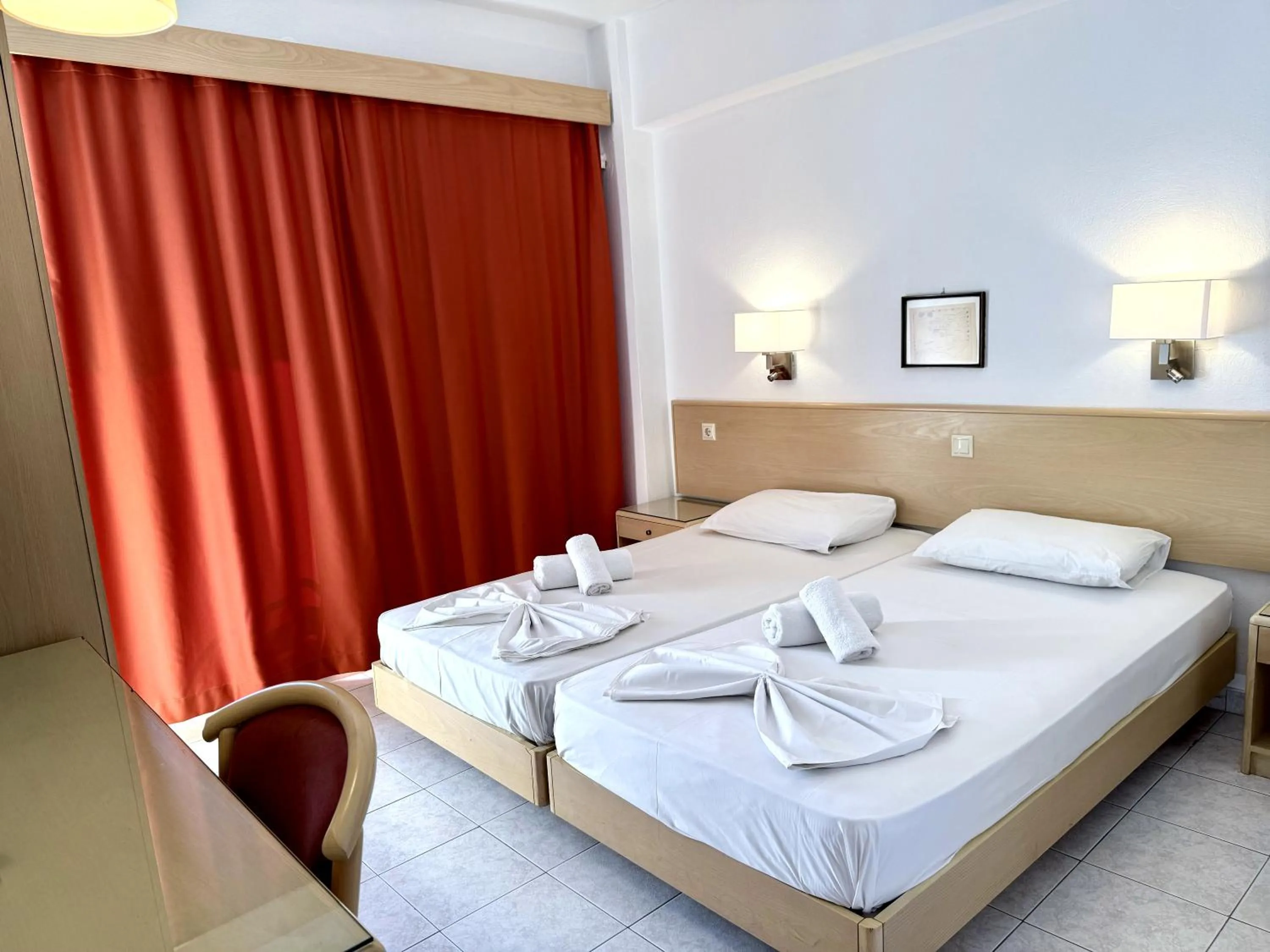 Bed in Savoy City Hotel