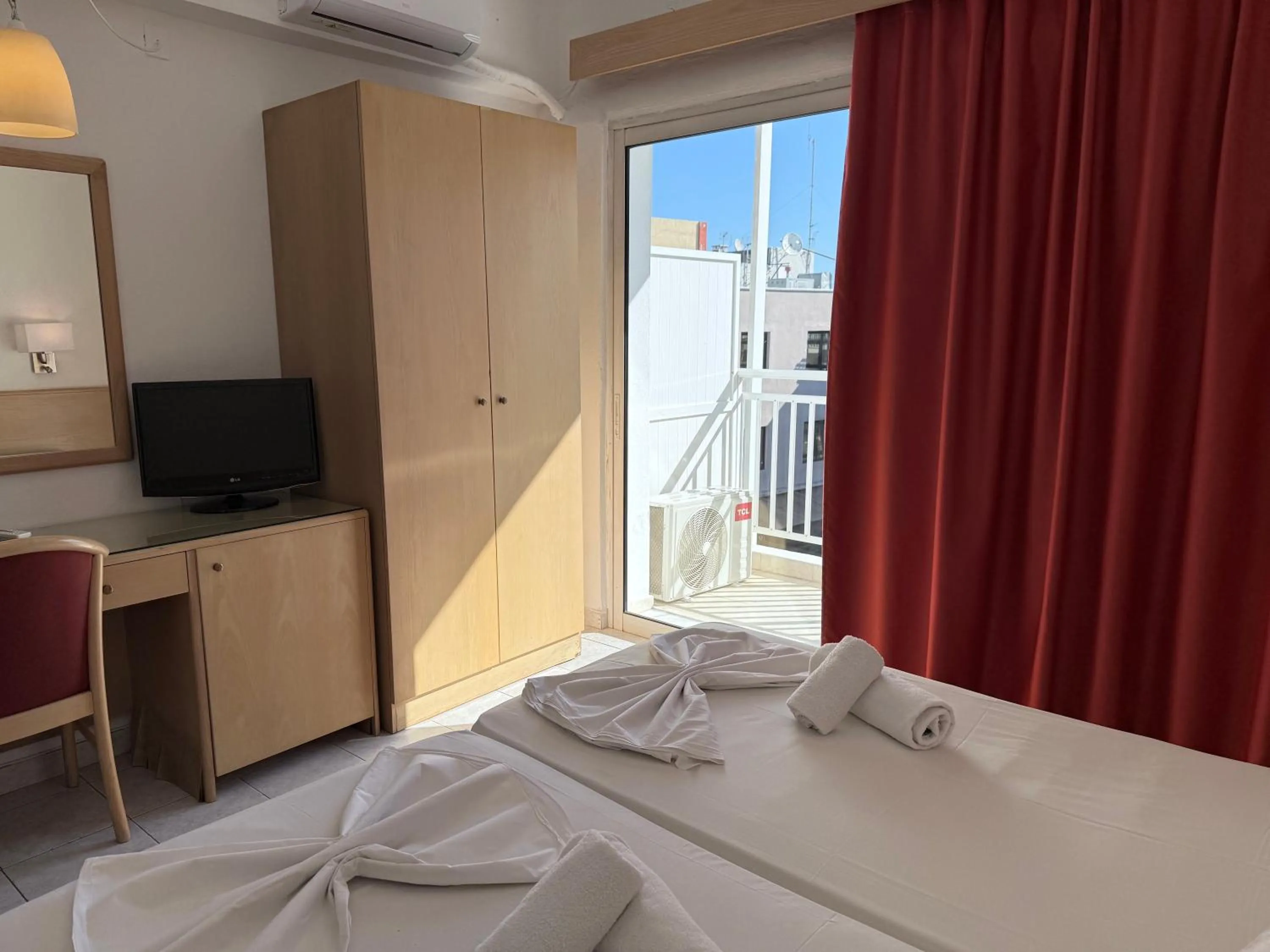 Bed in Savoy City Hotel