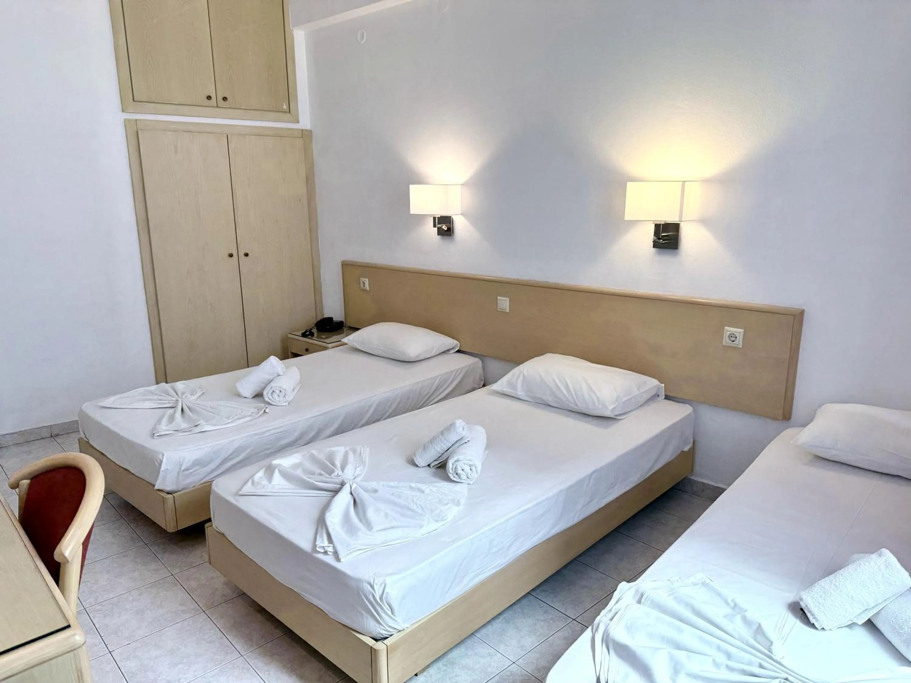 Bed in Savoy City Hotel