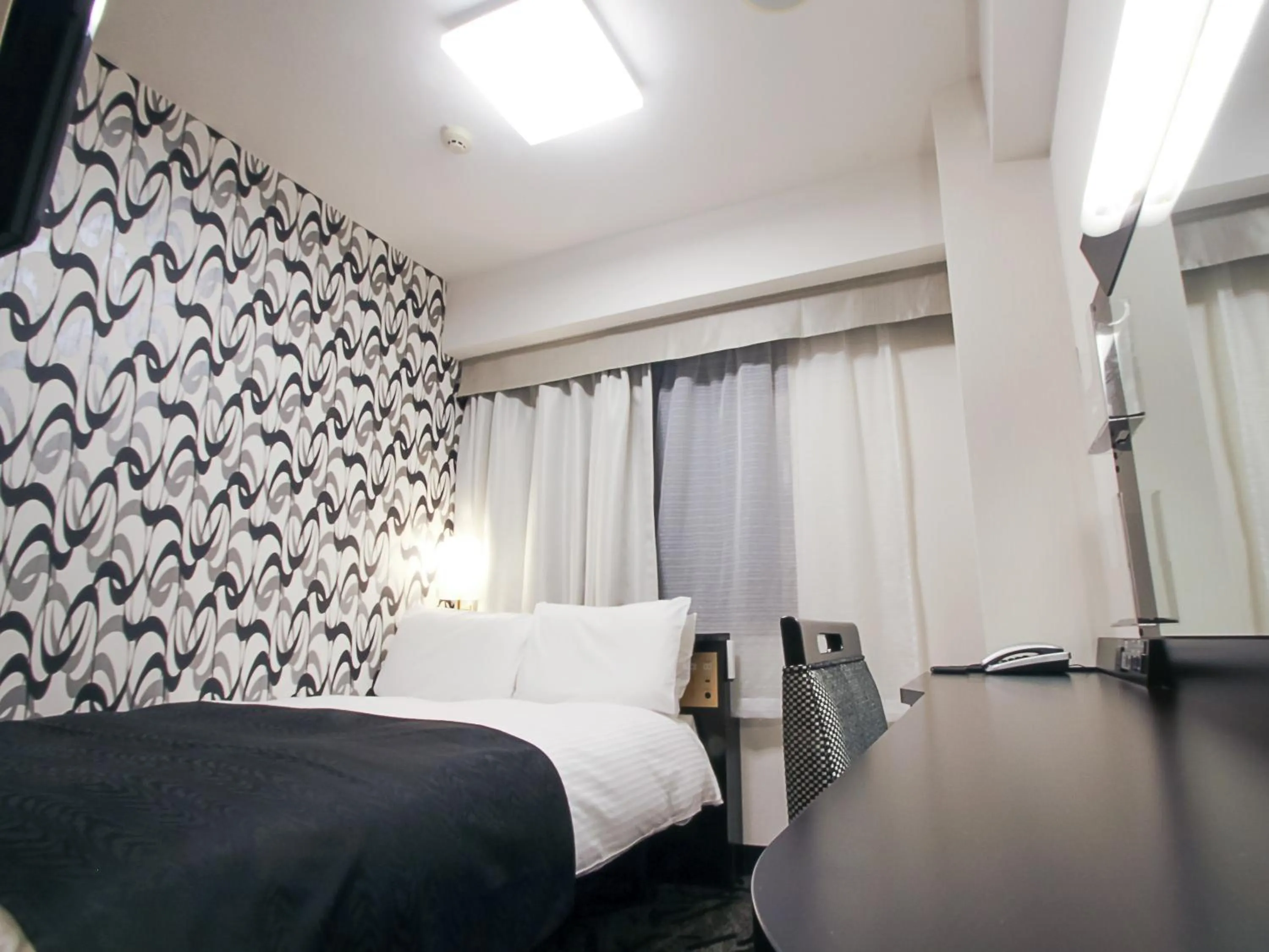 Photo of the whole room, Bed in APA Hotel Akita Senshu Koen