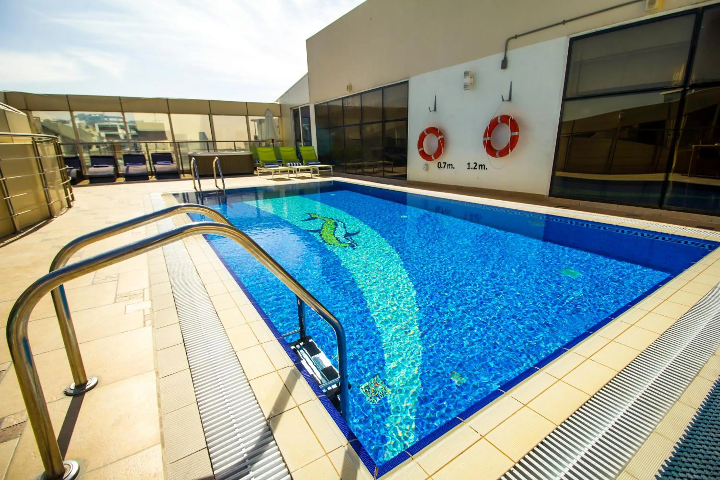 Swimming pool in The Royal Riviera Hotel Doha