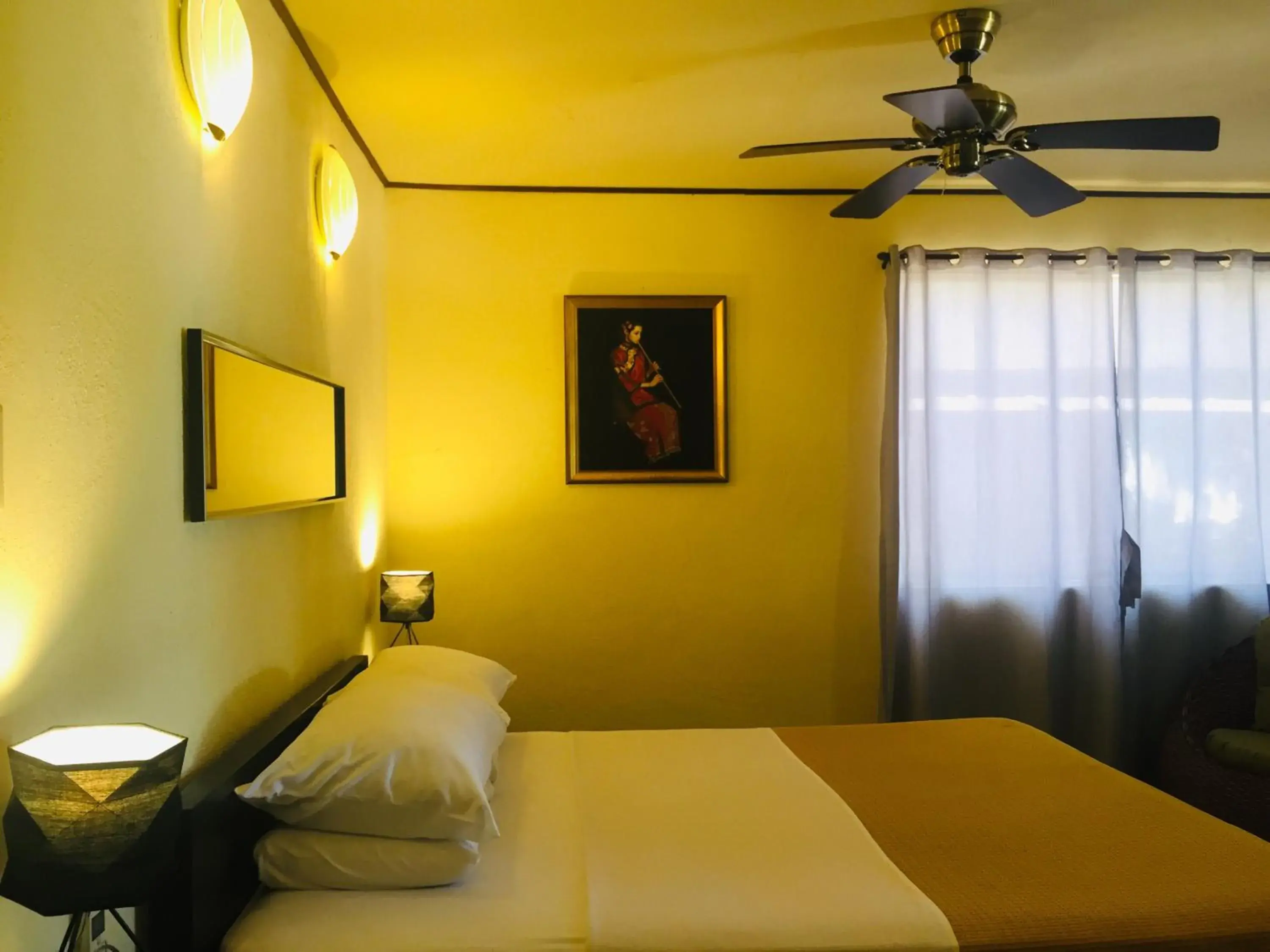 Bed in Angelina Beach Resort & Italian Restaurant Malapascua Bed in Angelina Beach Resort & Italian Restaurant Malapascua