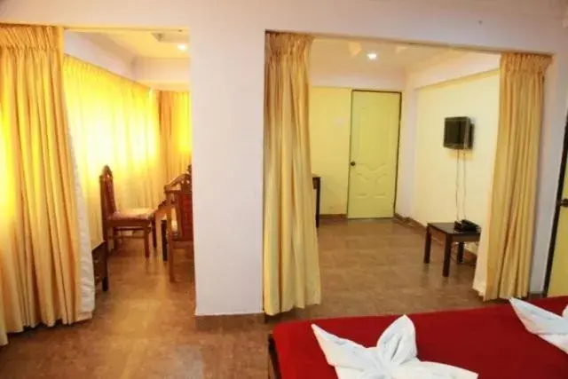 Photo of the whole room, Bed in Saiesh International Hotel Photo of the whole room, Bed in Saiesh International Hotel