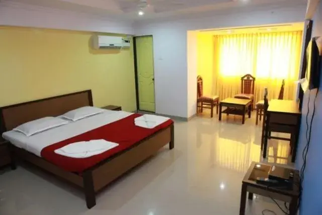 Photo of the whole room, Bed in Saiesh International Hotel Photo of the whole room, Bed in Saiesh International Hotel