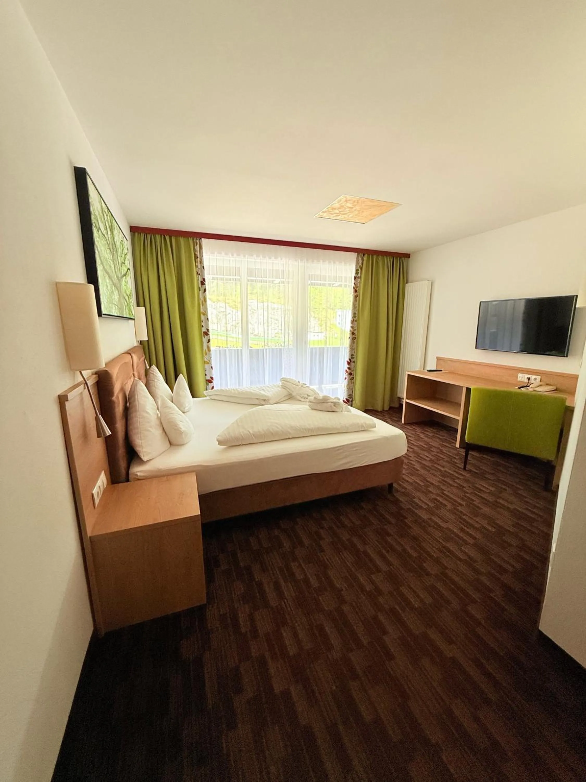 Bed in Hotel Achentalerhof