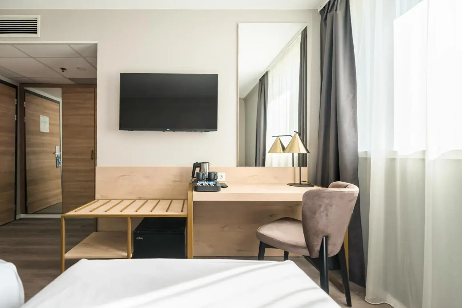 Seating area, Bed in Expo Tower by Mellow Mood Hotels Seating area, Bed in Expo Tower by Mellow Mood Hotels