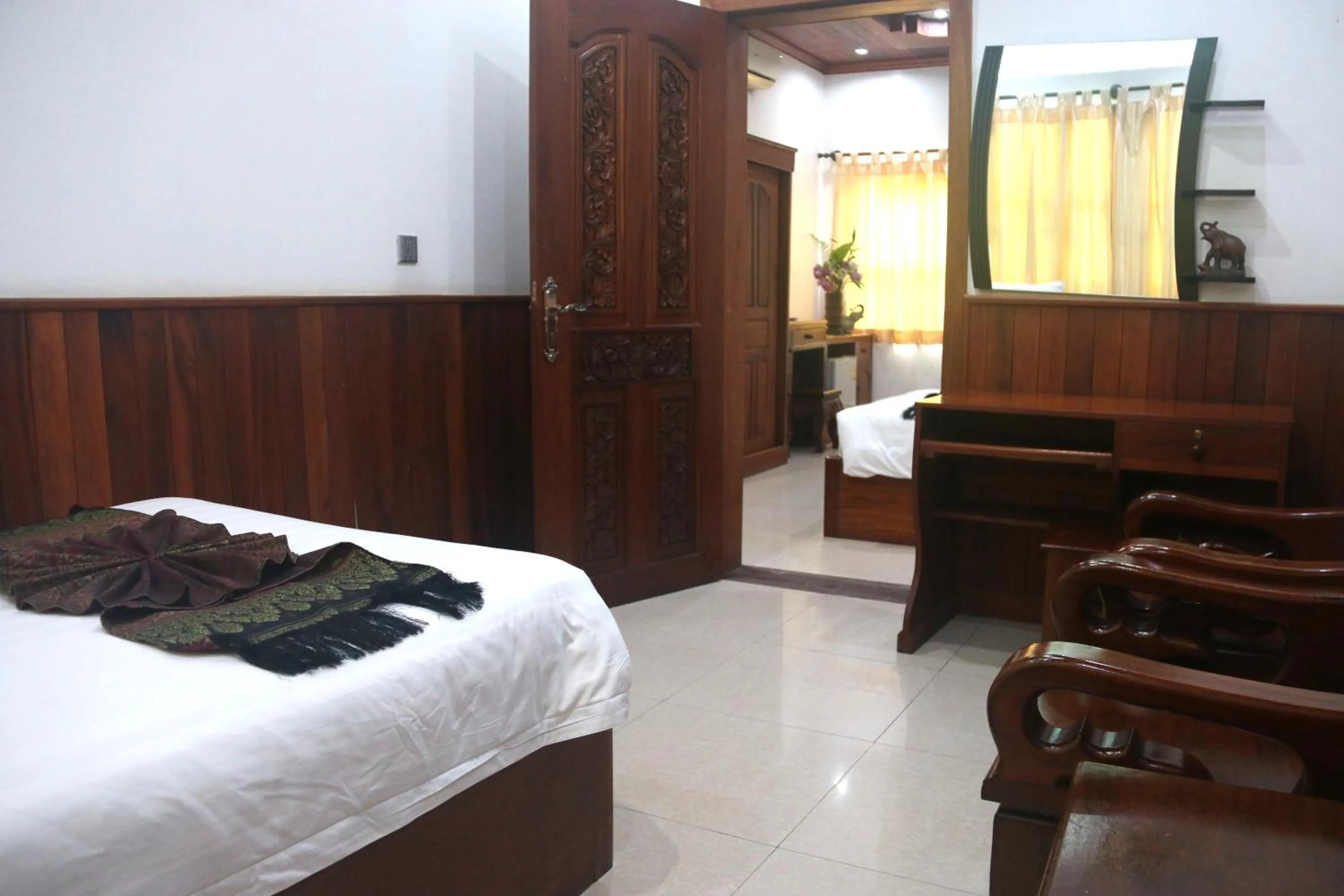 Bed in Shining Angkor Apartment Hotel