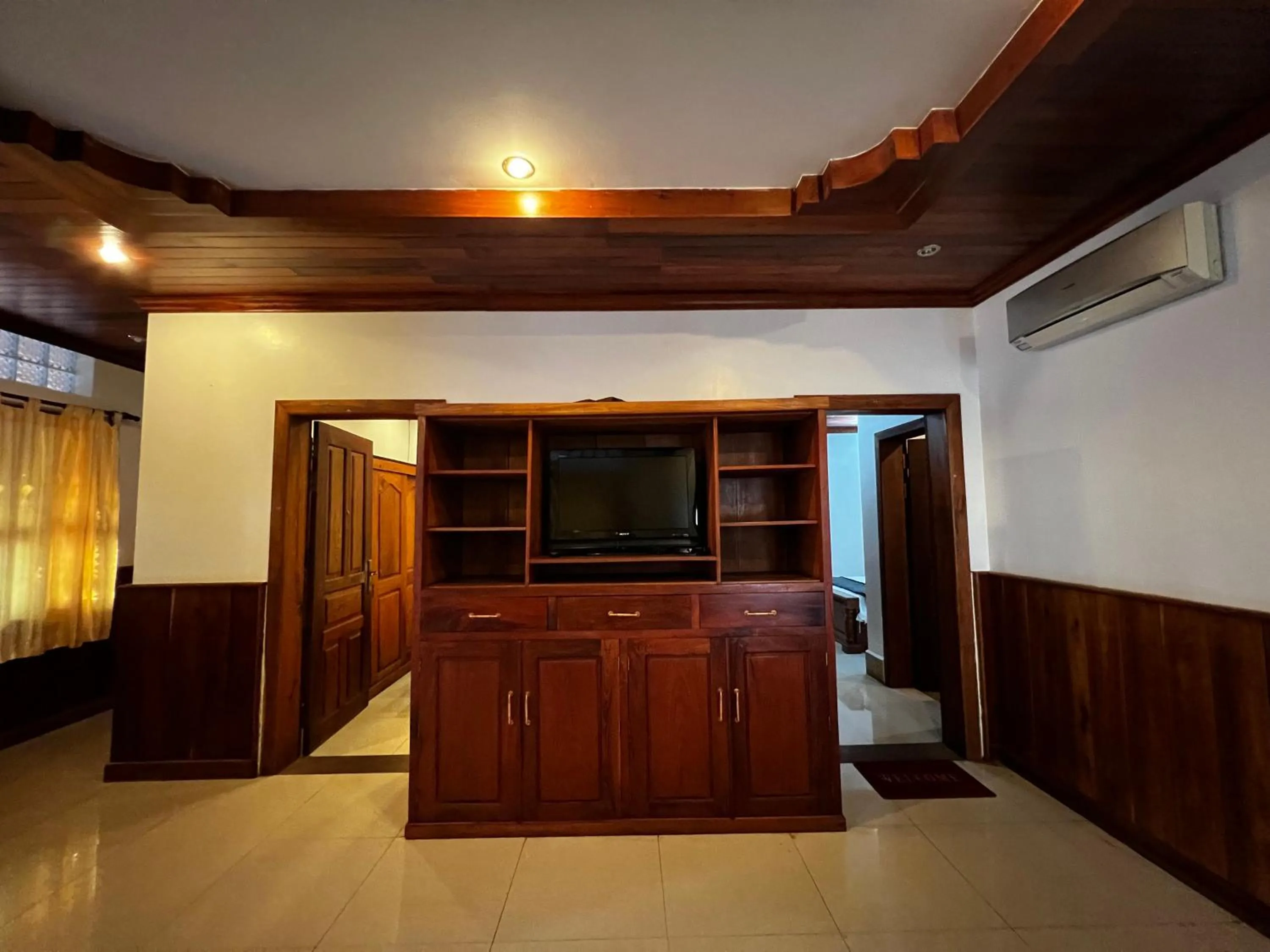 Communal lounge/ TV room in Shining Angkor Apartment Hotel