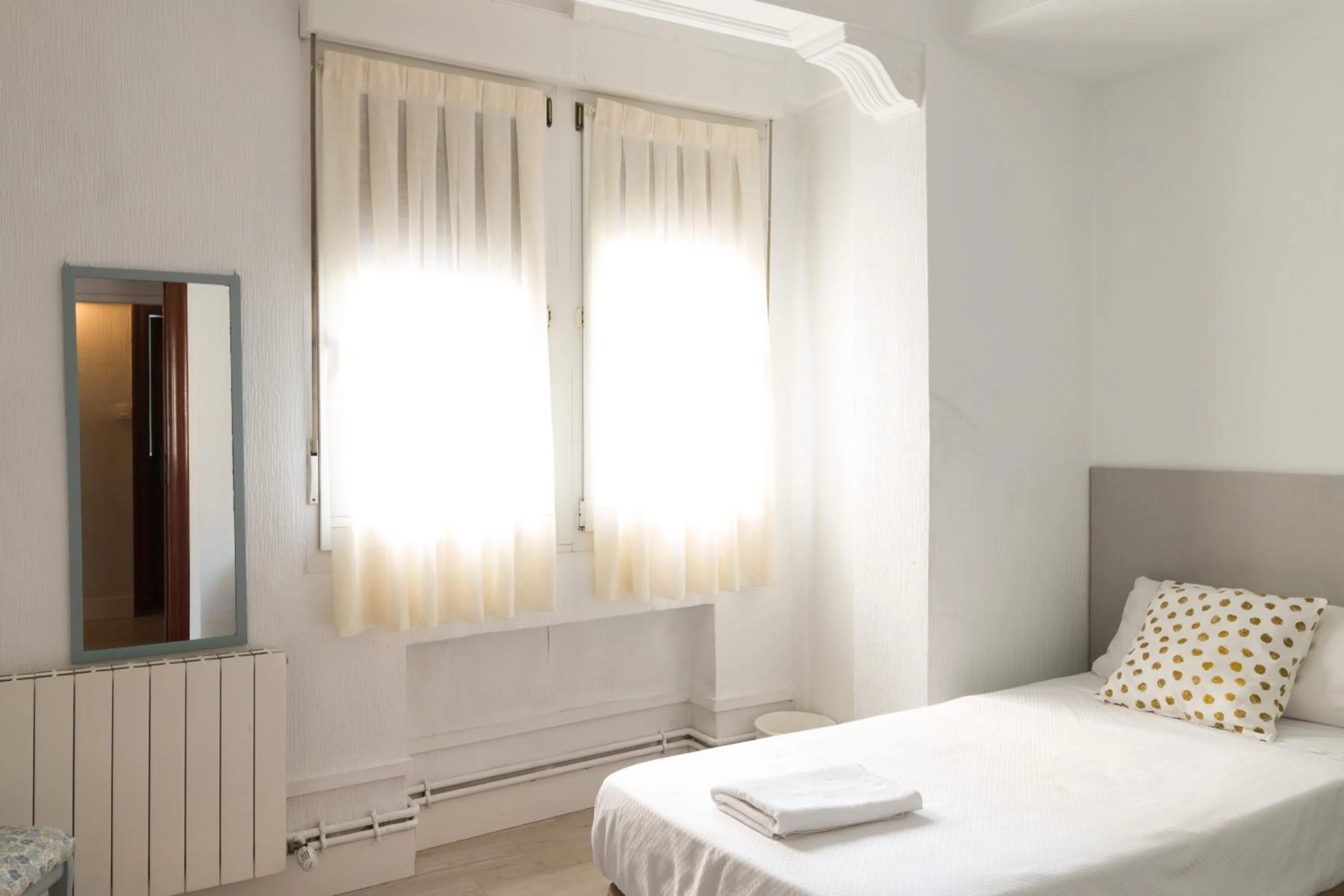 Bed in Pensión Arias