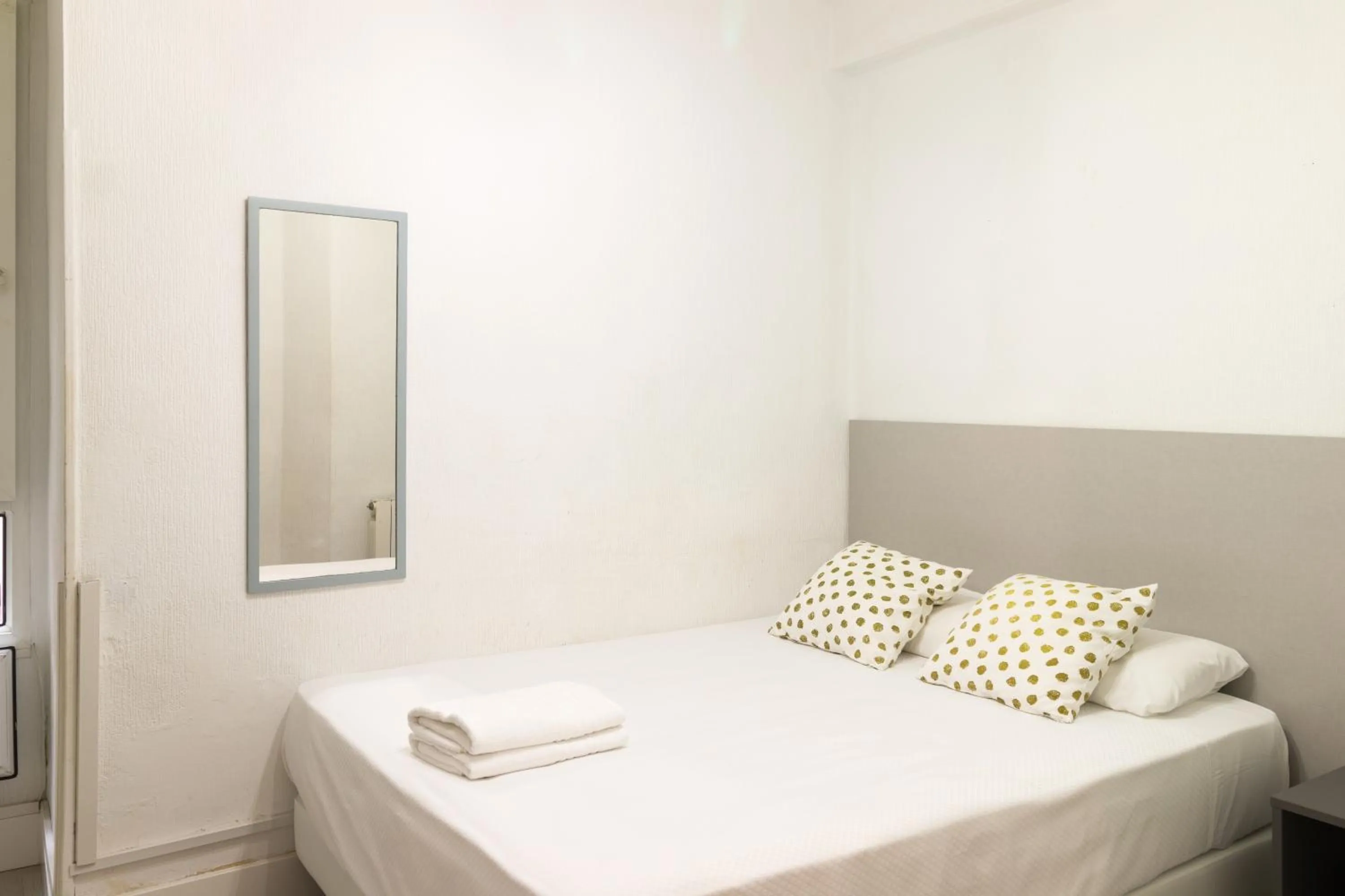 Bed in Pensión Arias