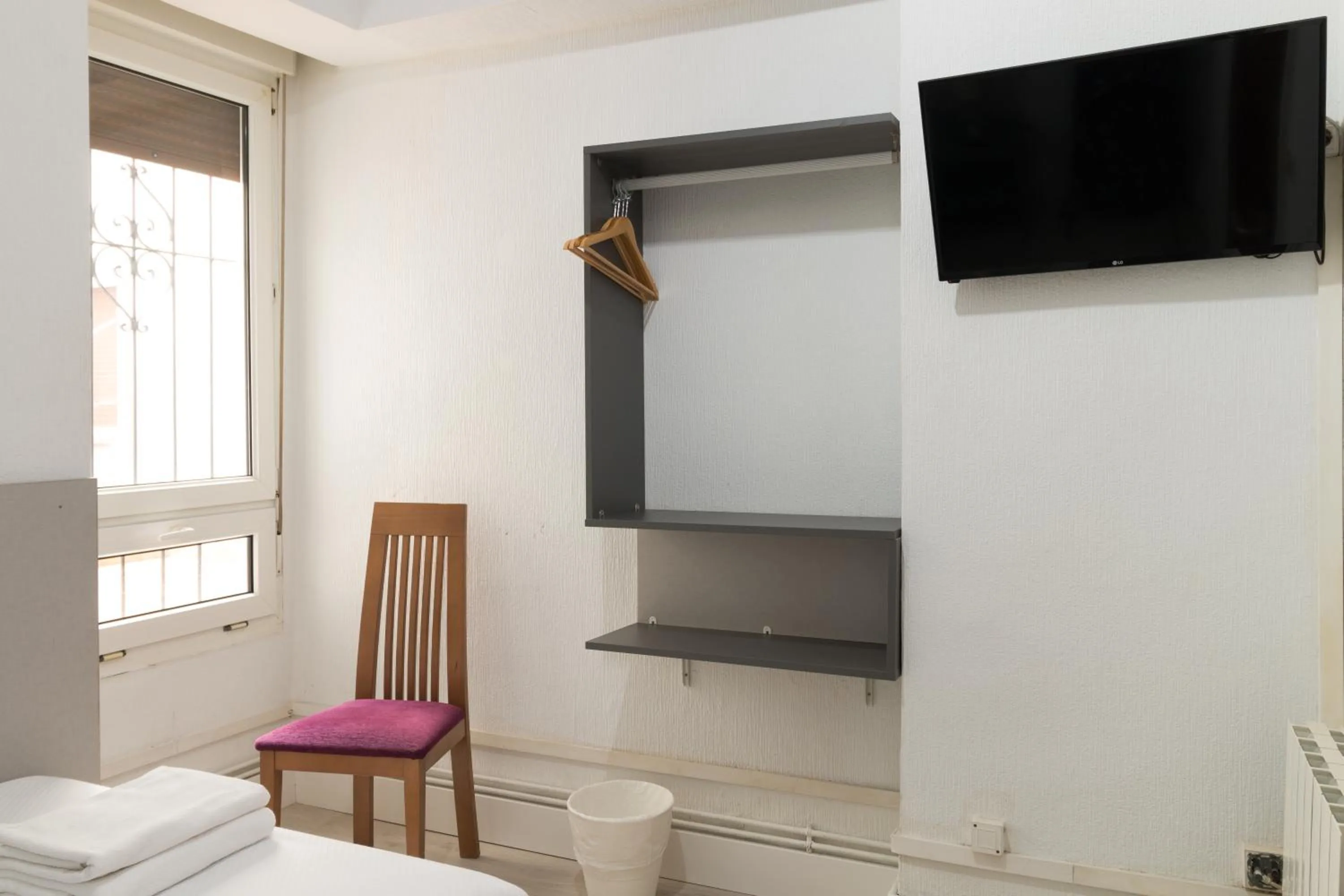 Bed in Pensión Arias