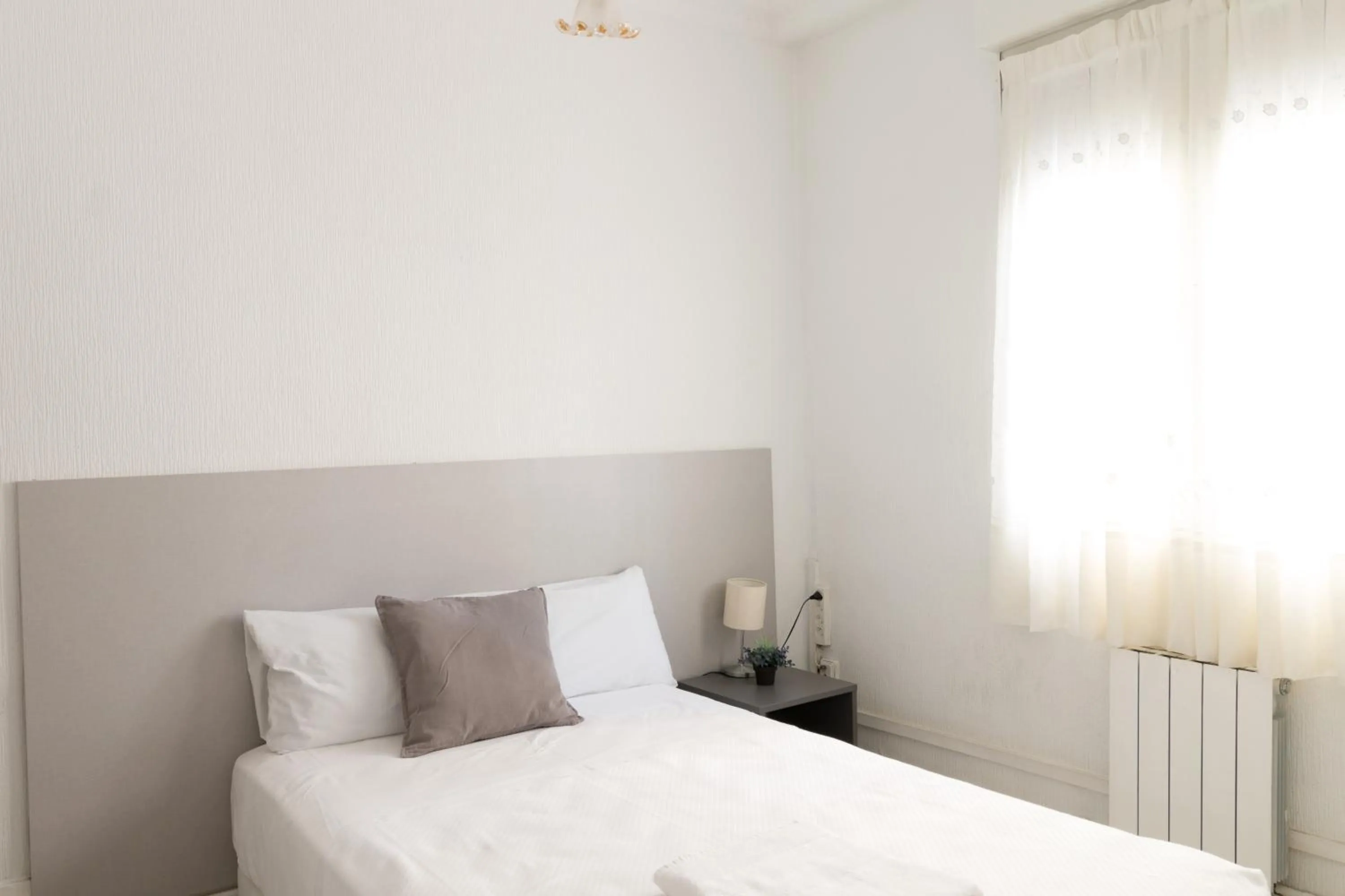 Bed in Pensión Arias