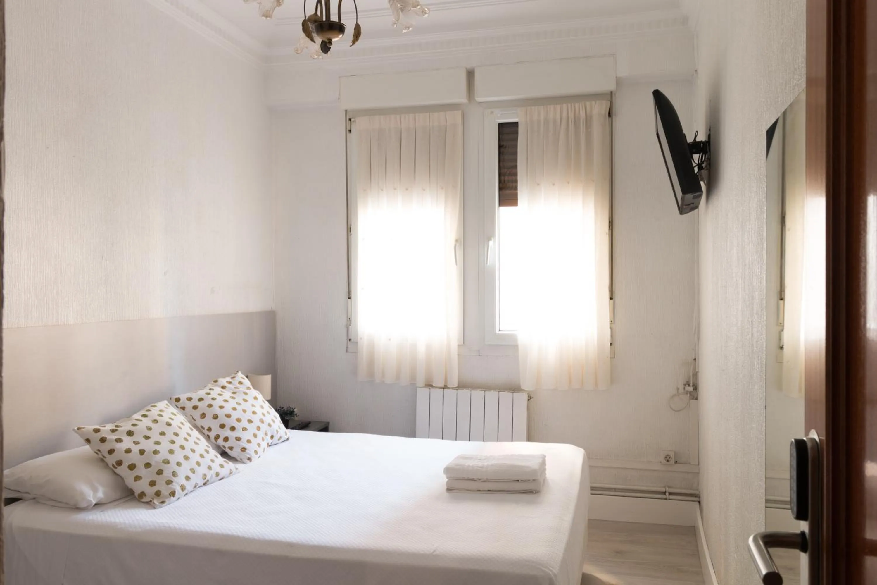 Bed in Pensión Arias