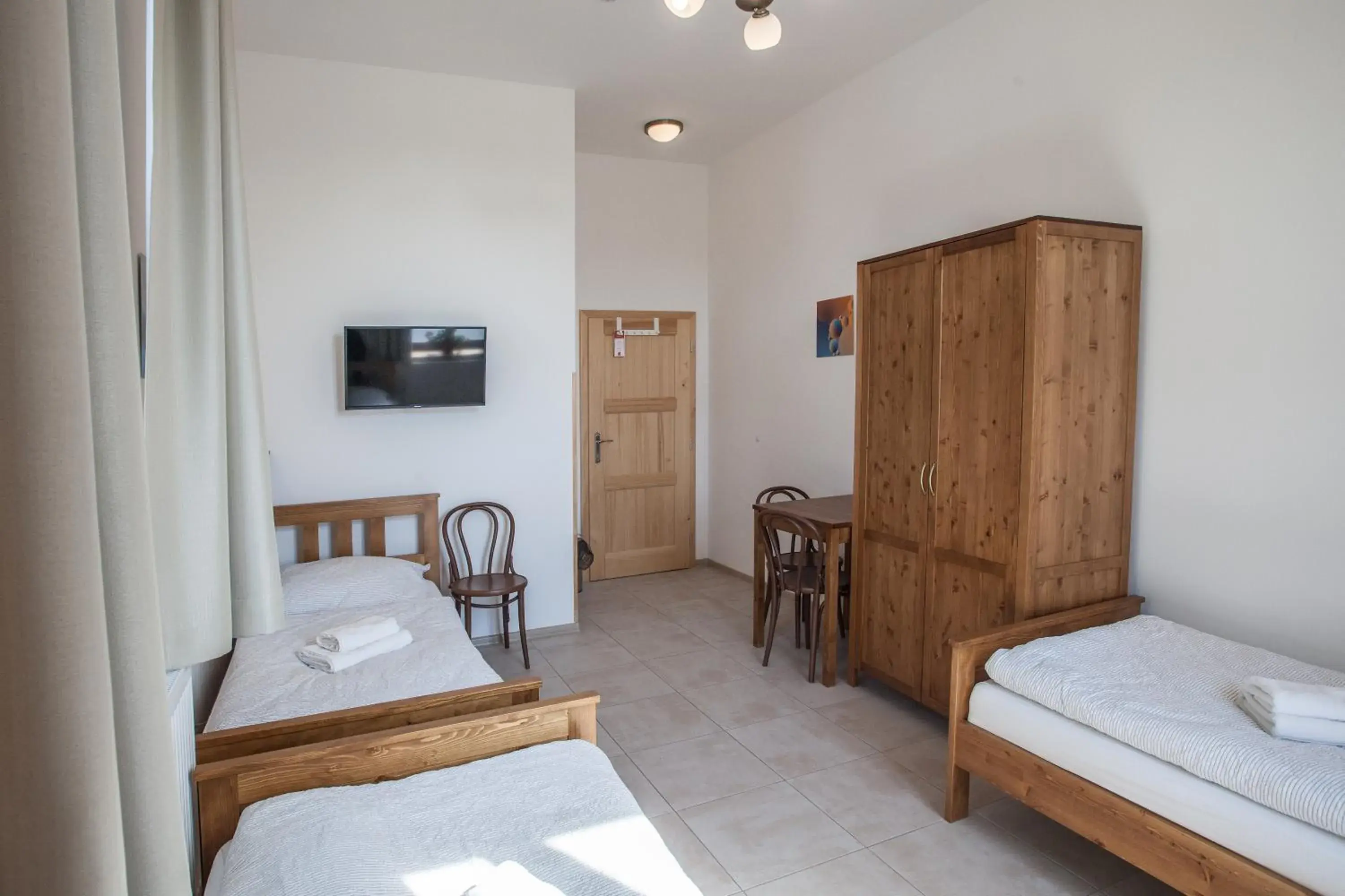 Basic Triple Room with Shared Bathroom - single occupancy in Penzion a restaurace U Hájků Basic Triple Room with Shared Bathroom - single occupancy in Penzion a restaurace U Hájků