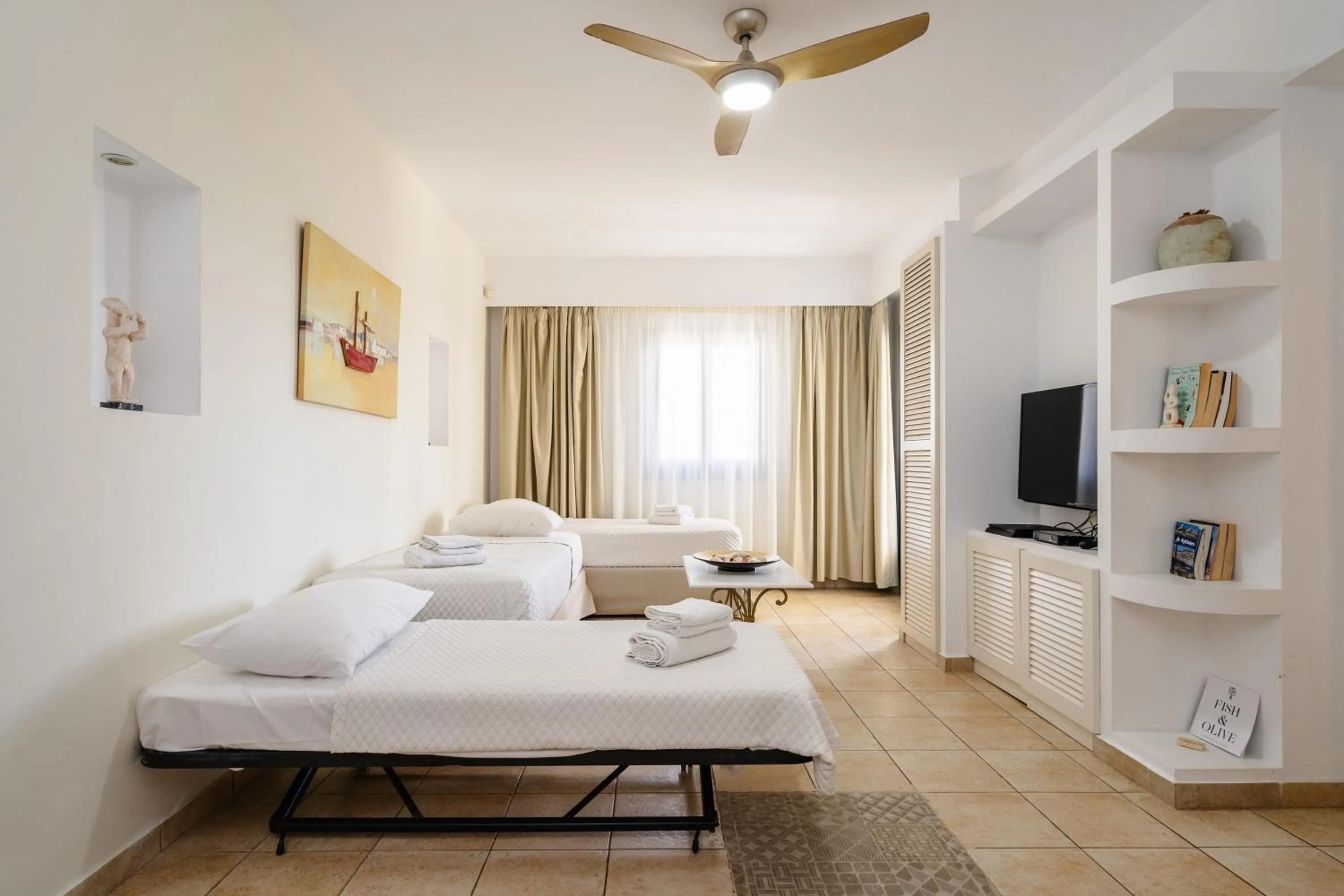 Toilet, Bed in Mitos Suites