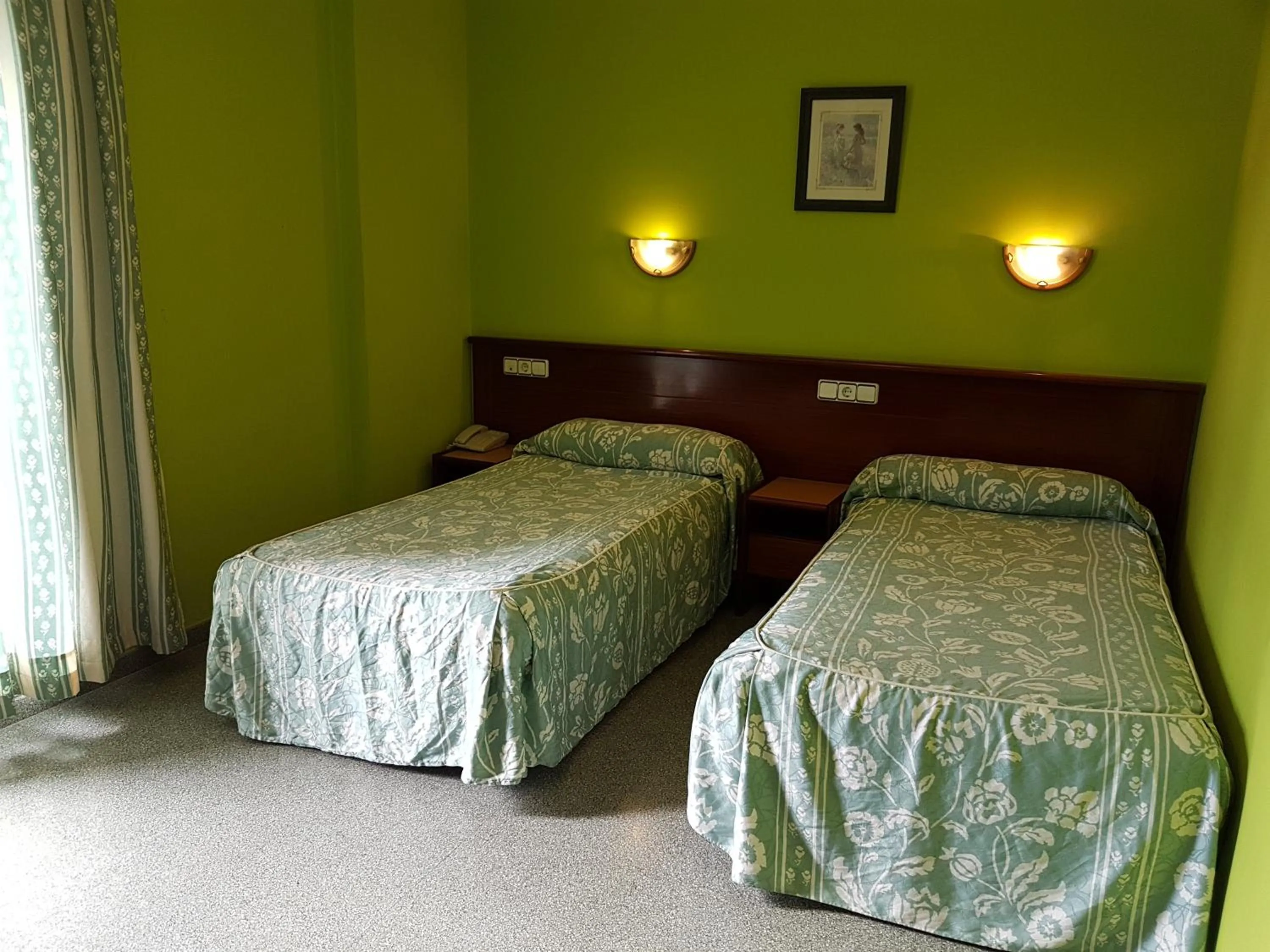 Bed in Hotel Don Pelayo