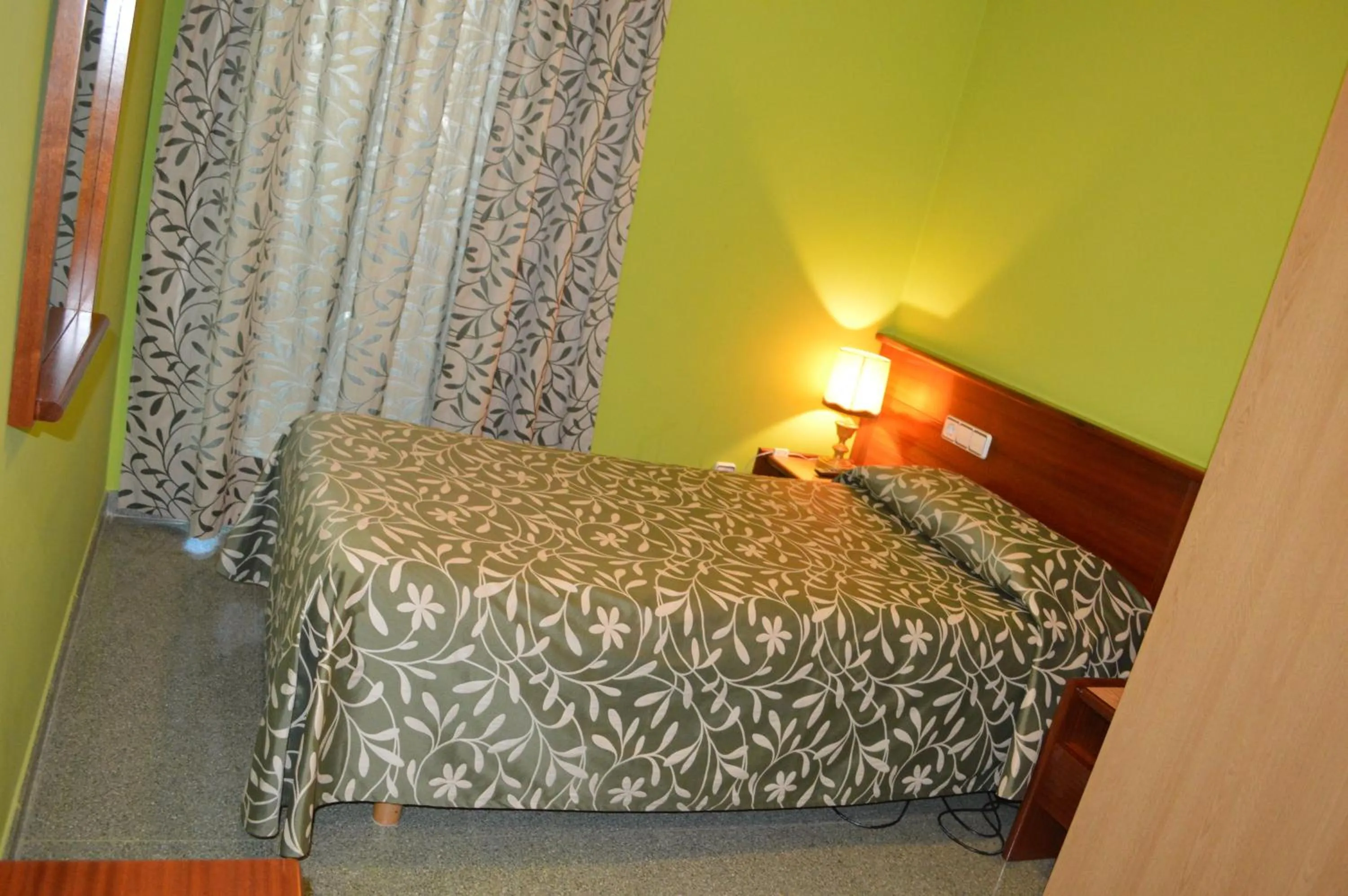 Bed in Hotel Don Pelayo