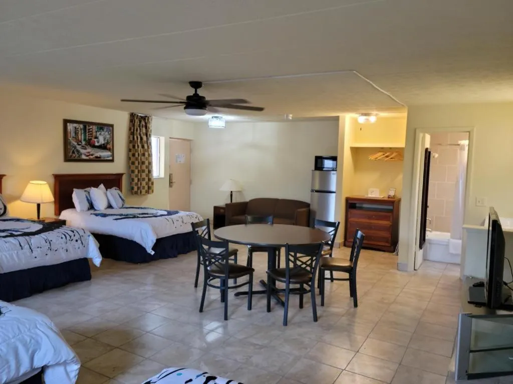 Bed in Wolf Inn Hotel