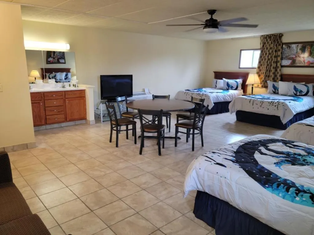 Bed in Wolf Inn Hotel