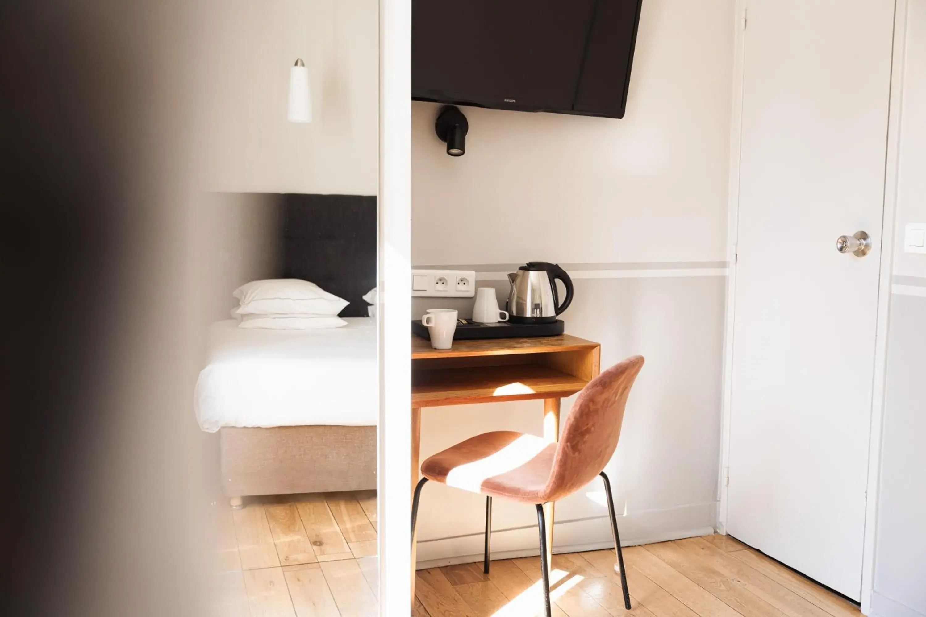 Photo of the whole room, Bed in Hôtel Eiffel Segur Photo of the whole room, Bed in Hôtel Eiffel Segur