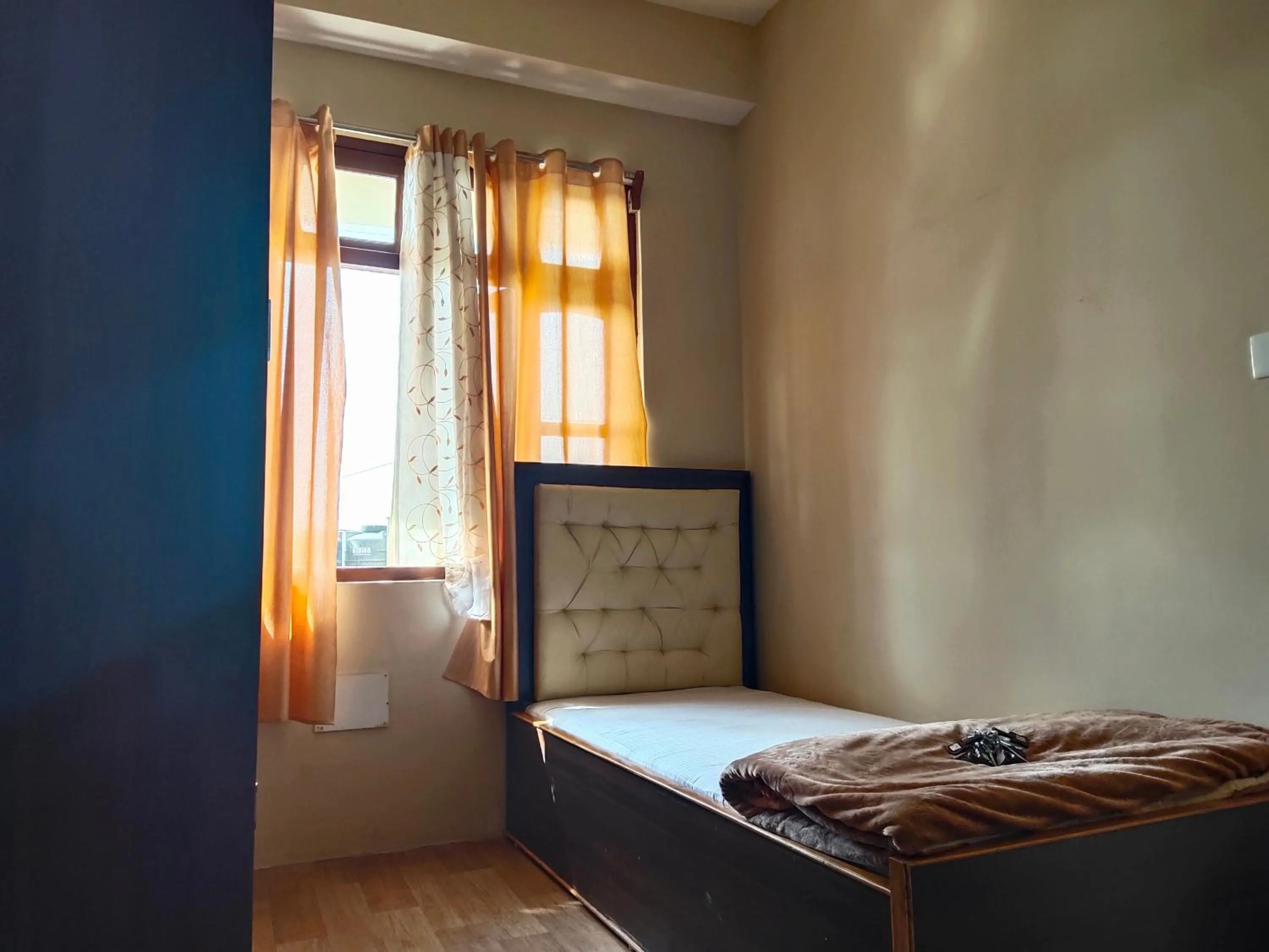 Photo of the whole room, Bed in Great Eastern Valley Residency