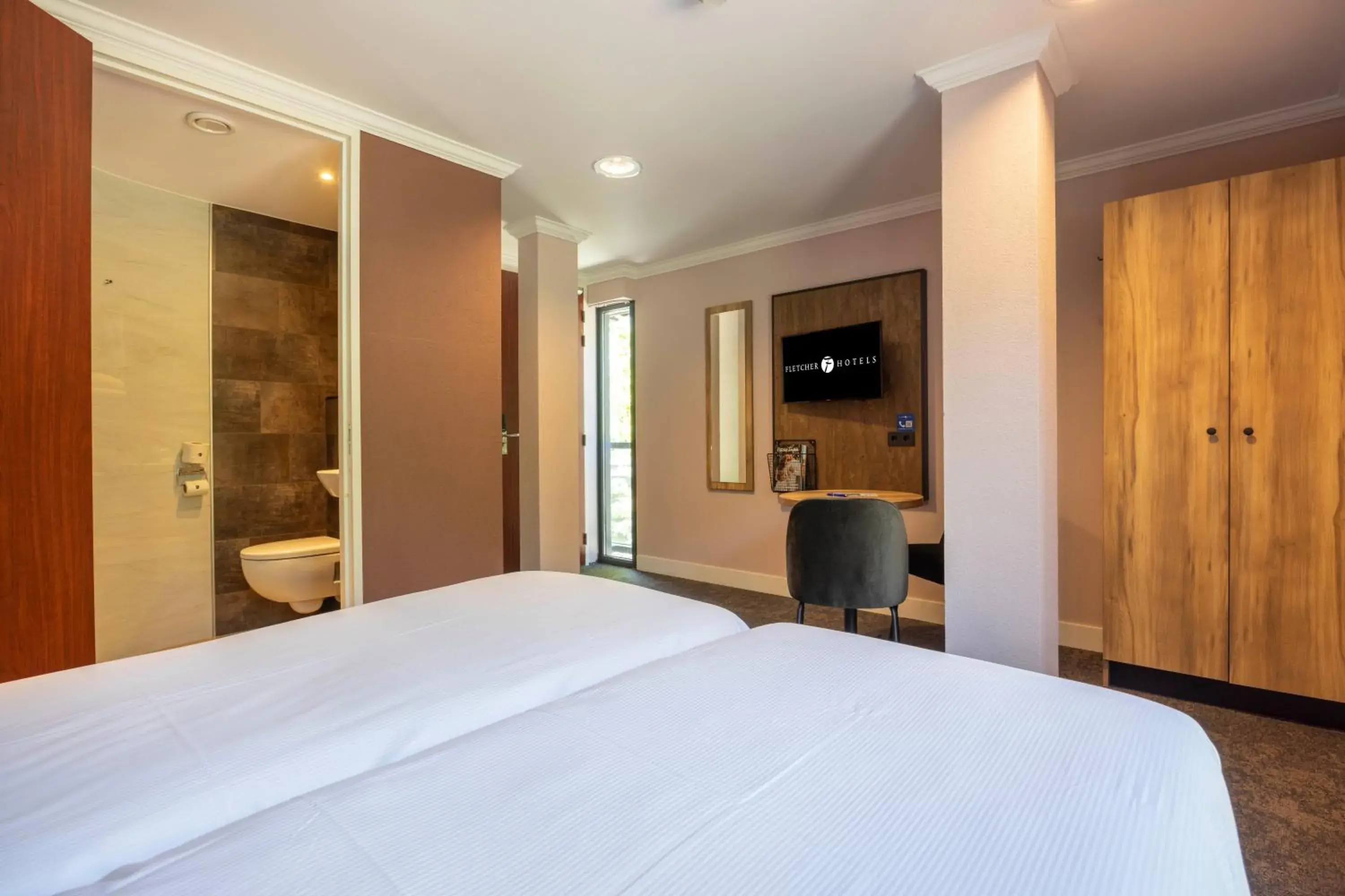 Bed in Fletcher Hotel-Restaurant De Kempen Bed in Fletcher Hotel-Restaurant De Kempen