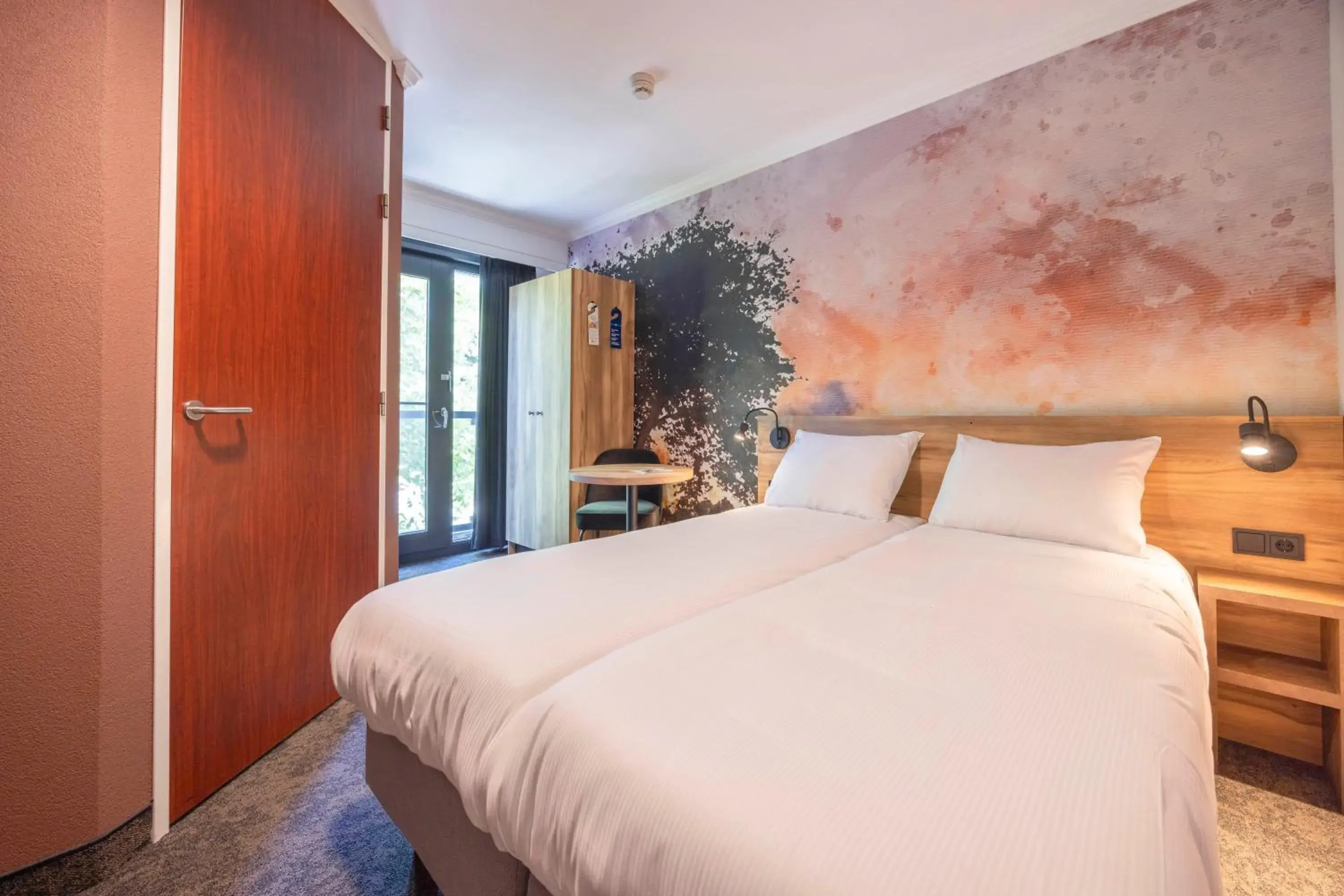 Bed in Fletcher Hotel-Restaurant De Kempen Bed in Fletcher Hotel-Restaurant De Kempen