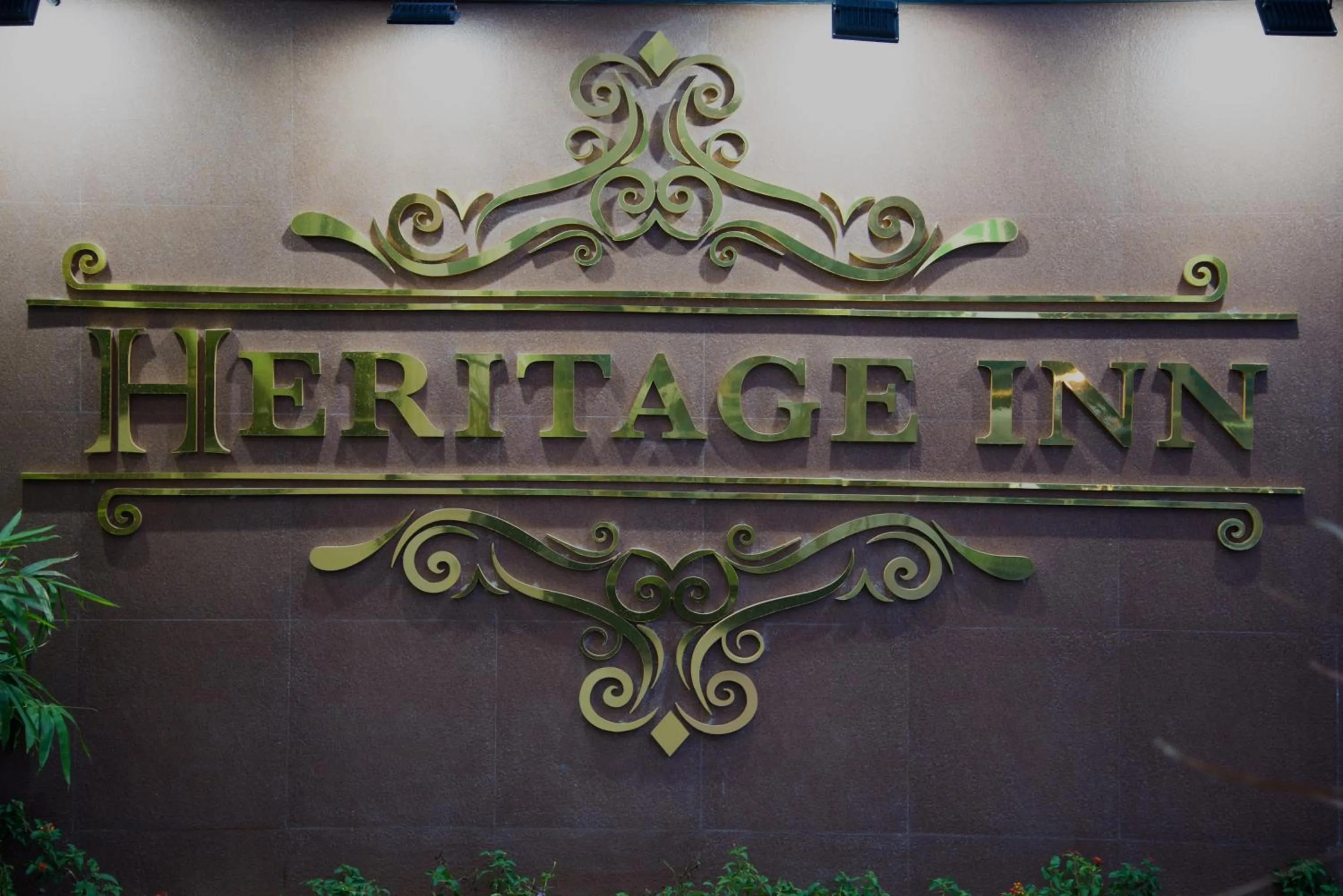 Property logo or sign in Heritage Inn