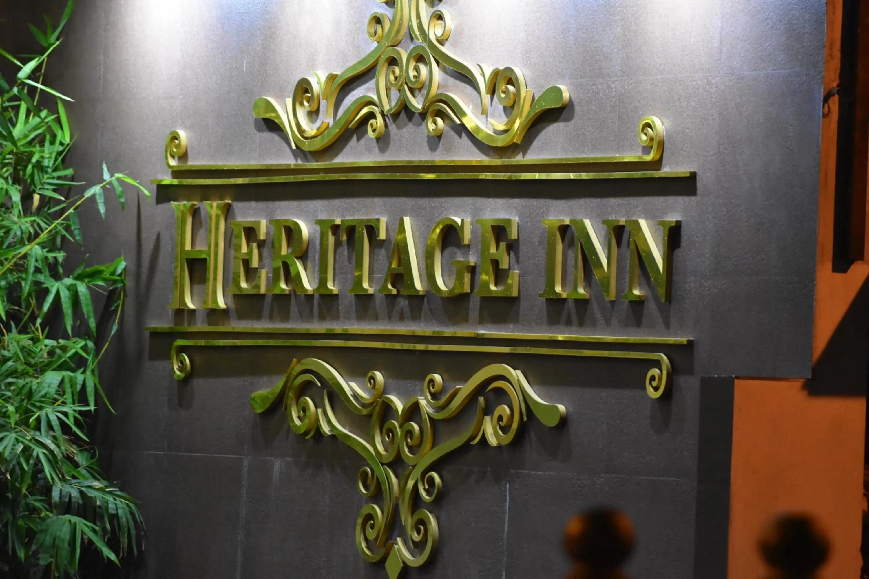 Property logo or sign in Heritage Inn