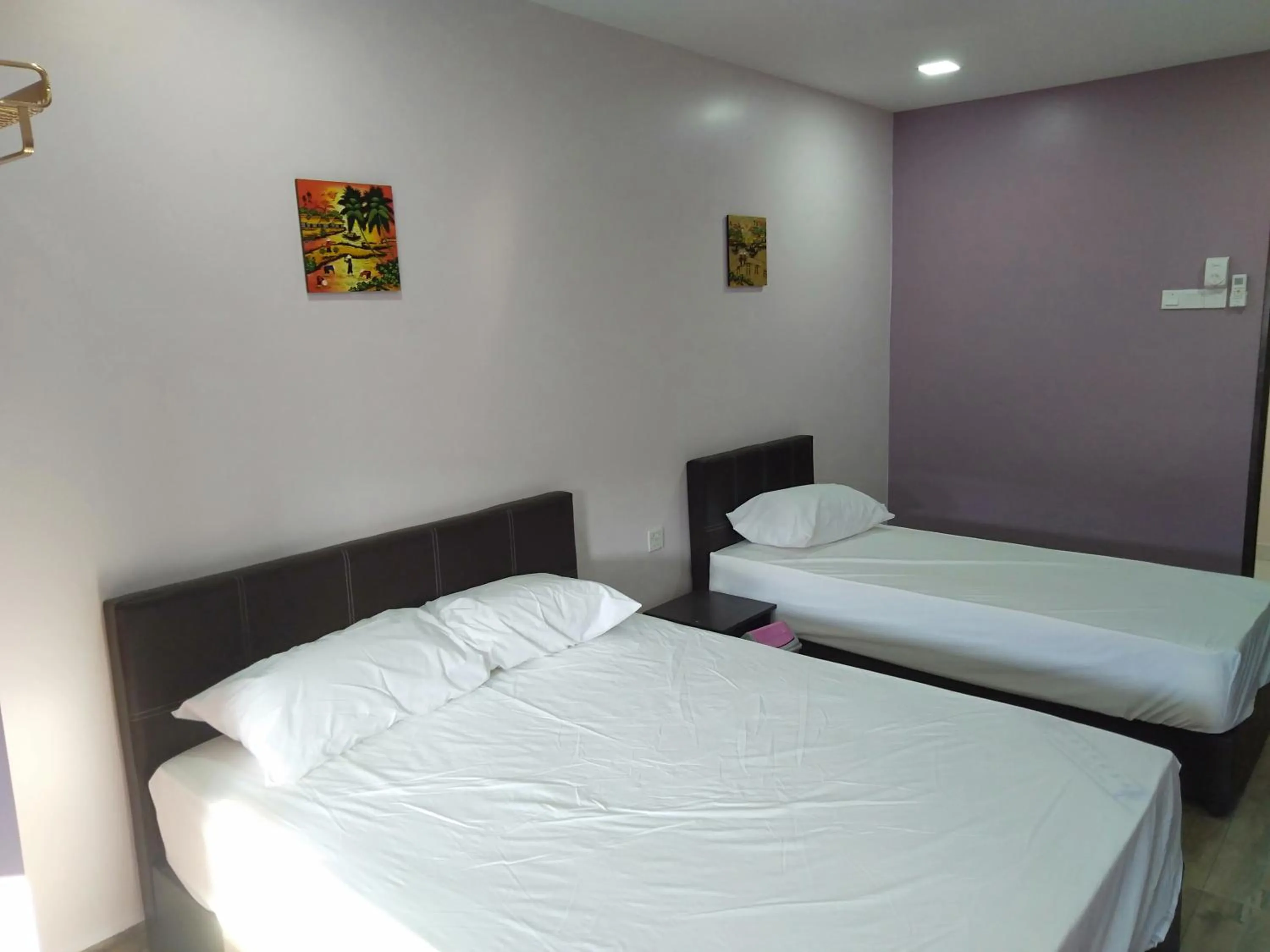 Photo of the whole room, Bed in Purple Dream Home