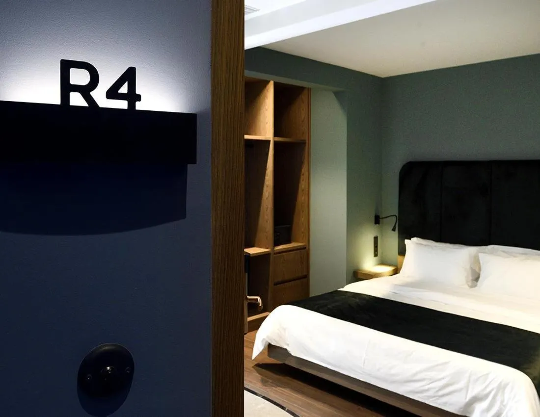 Bedroom, Bed in Roomore Apartments