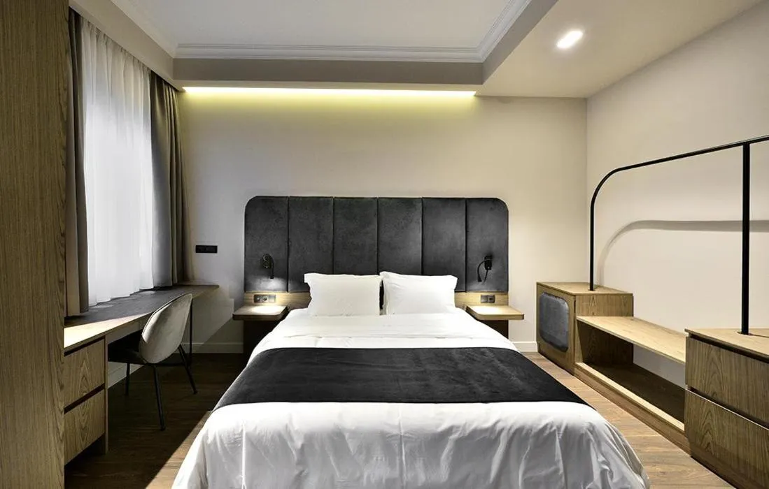 Bedroom, Bed in Roomore Apartments