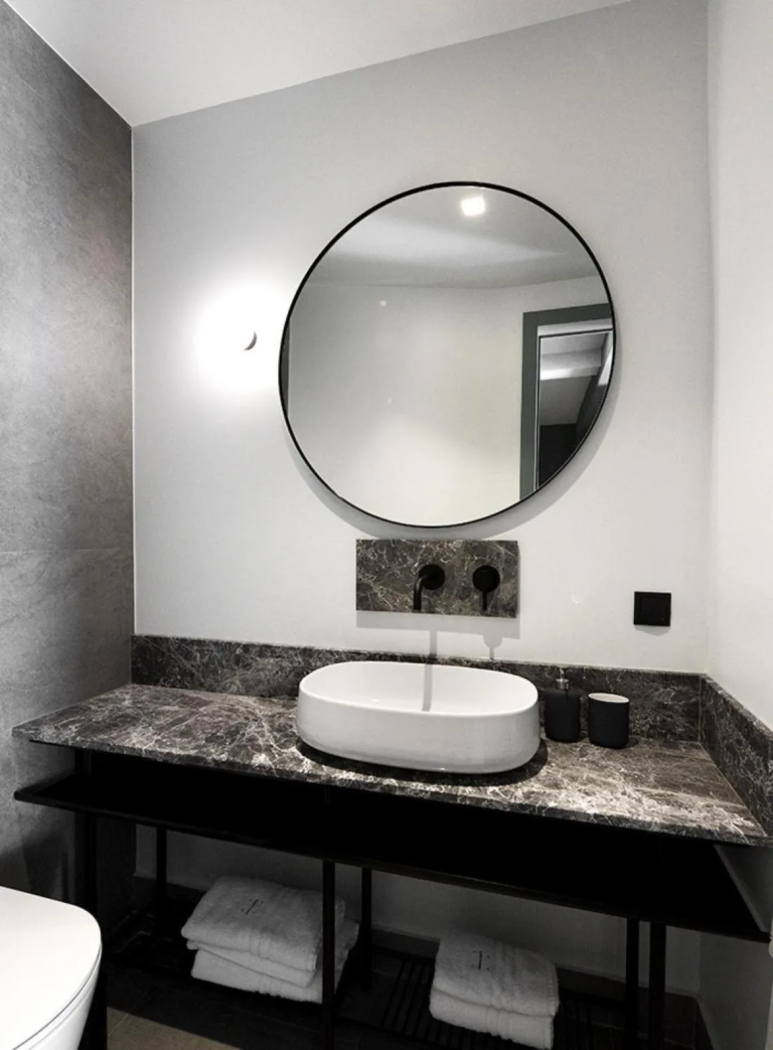 Bathroom in Roomore Apartments