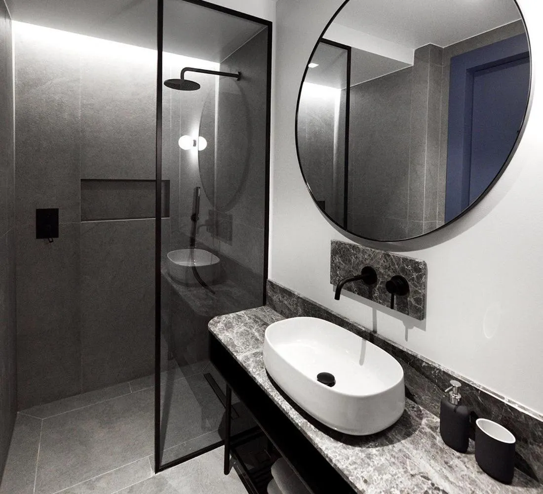 Bathroom in Roomore Apartments