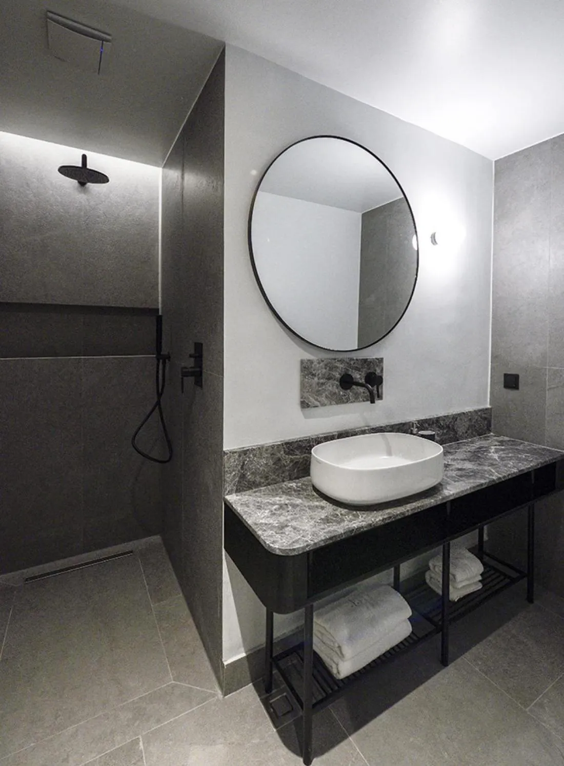 Bathroom in Roomore Apartments