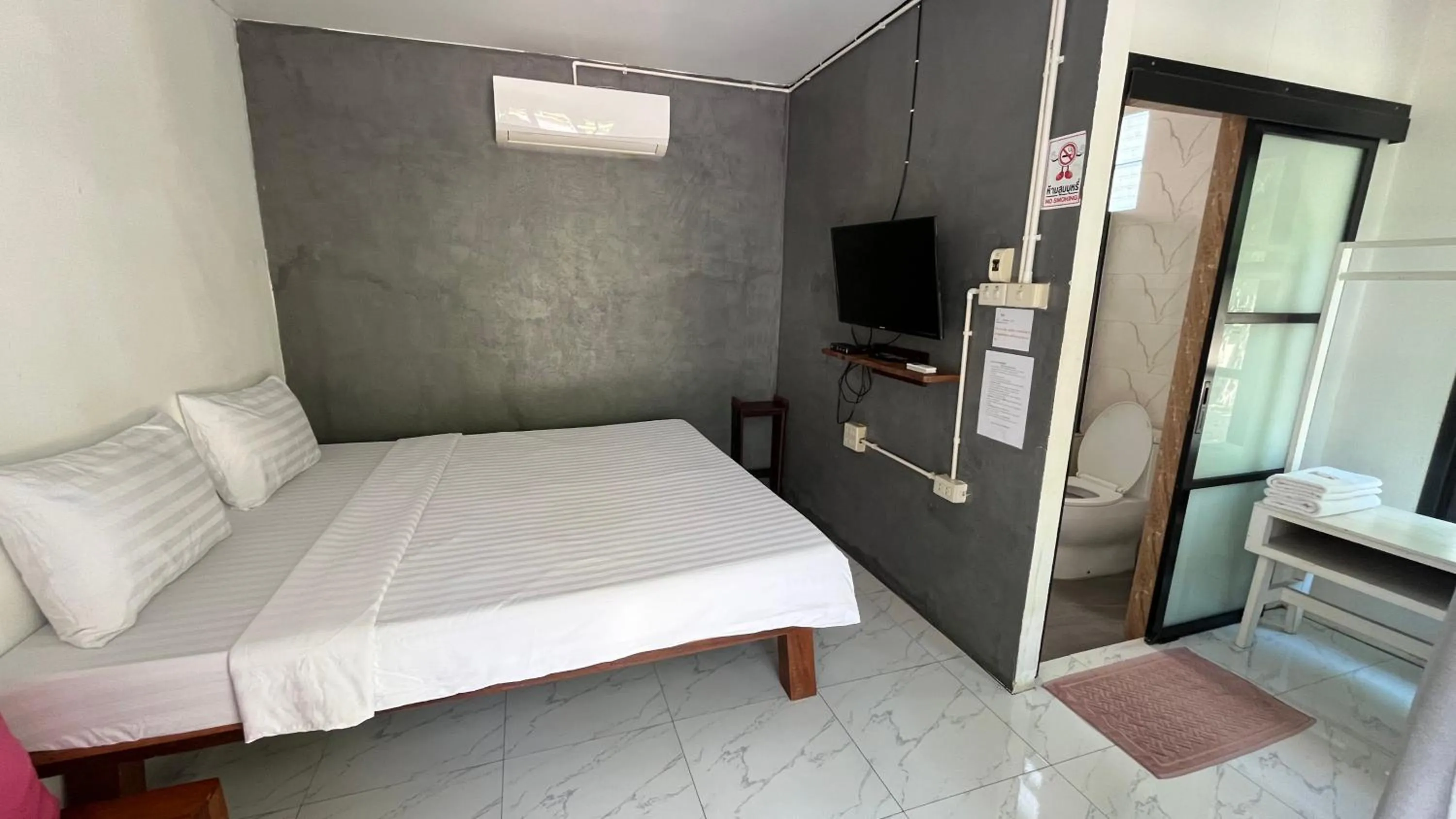 Bed in Sangkaset Resort