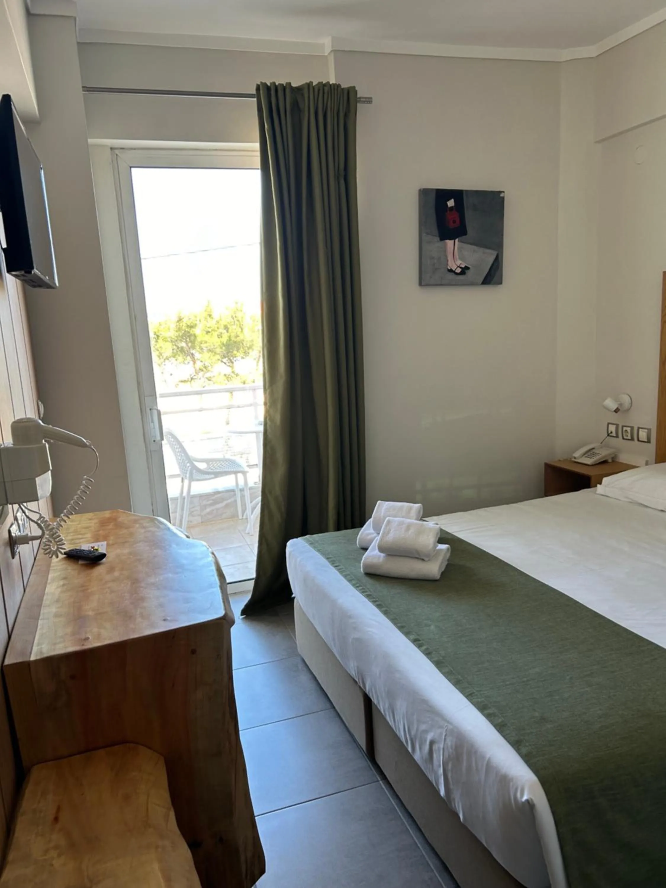 Property building, Bed in Perea Hotel